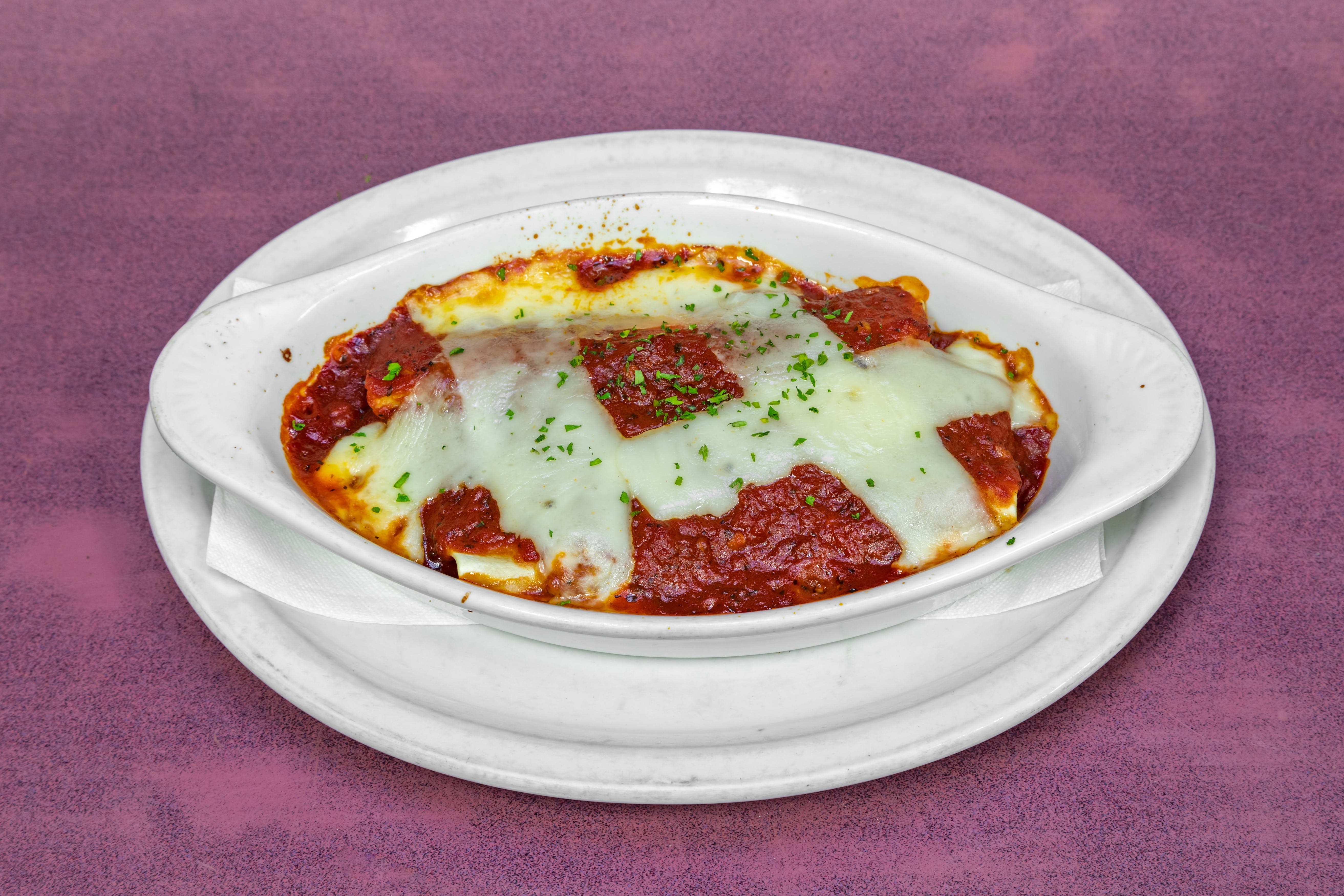 Order Baked Manicotti - 2 Pieces food online from Red Devil Italian Restaurant store, Tempe on bringmethat.com