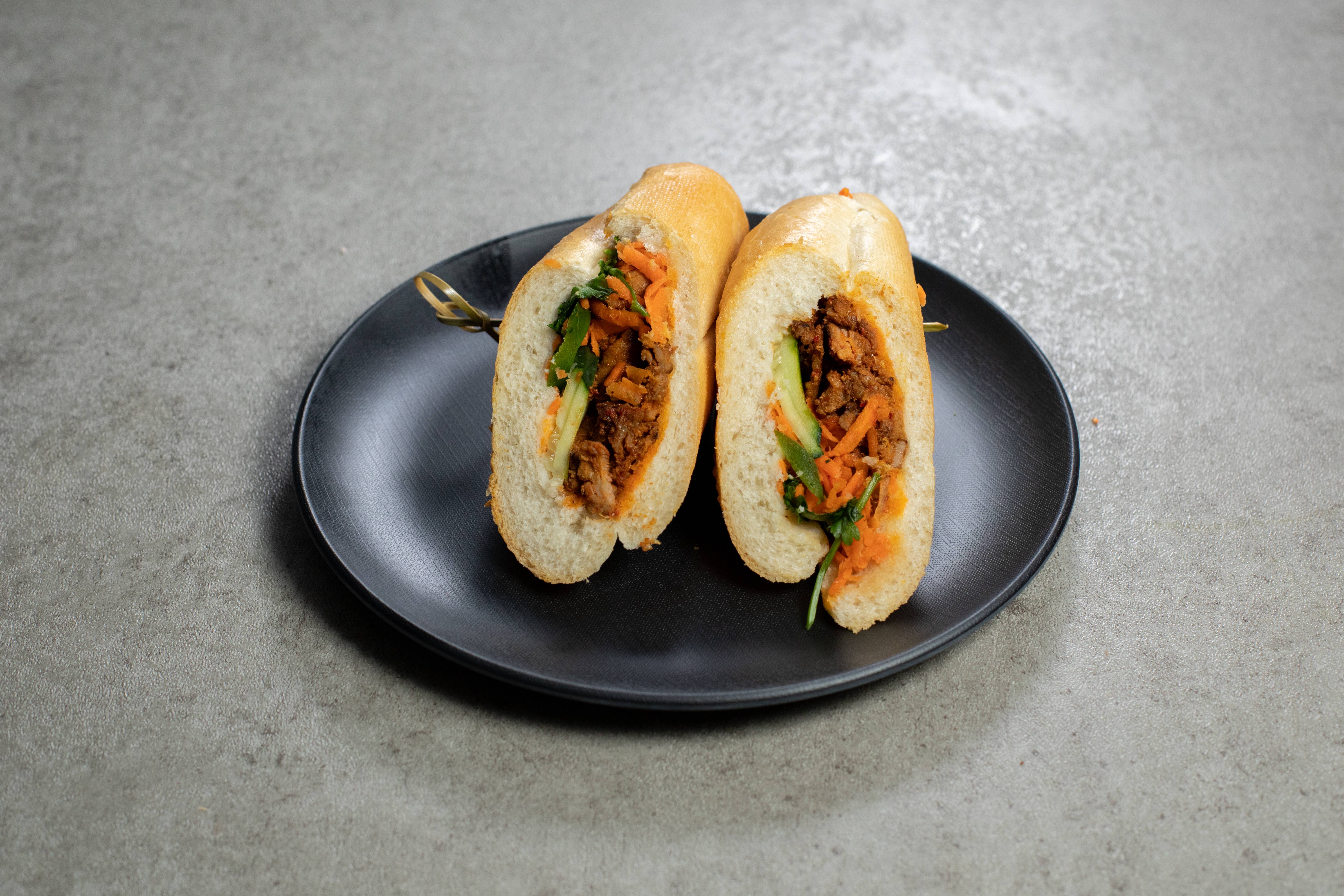 Order Spicy Pork Sandwich food online from Bao Bao Banh Mi store, Houston on bringmethat.com