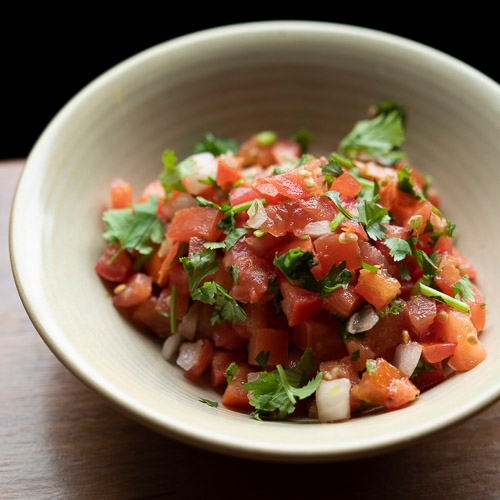 Order Side Large Pico de Gallo food online from Cactus Restaurant store, Seattle on bringmethat.com