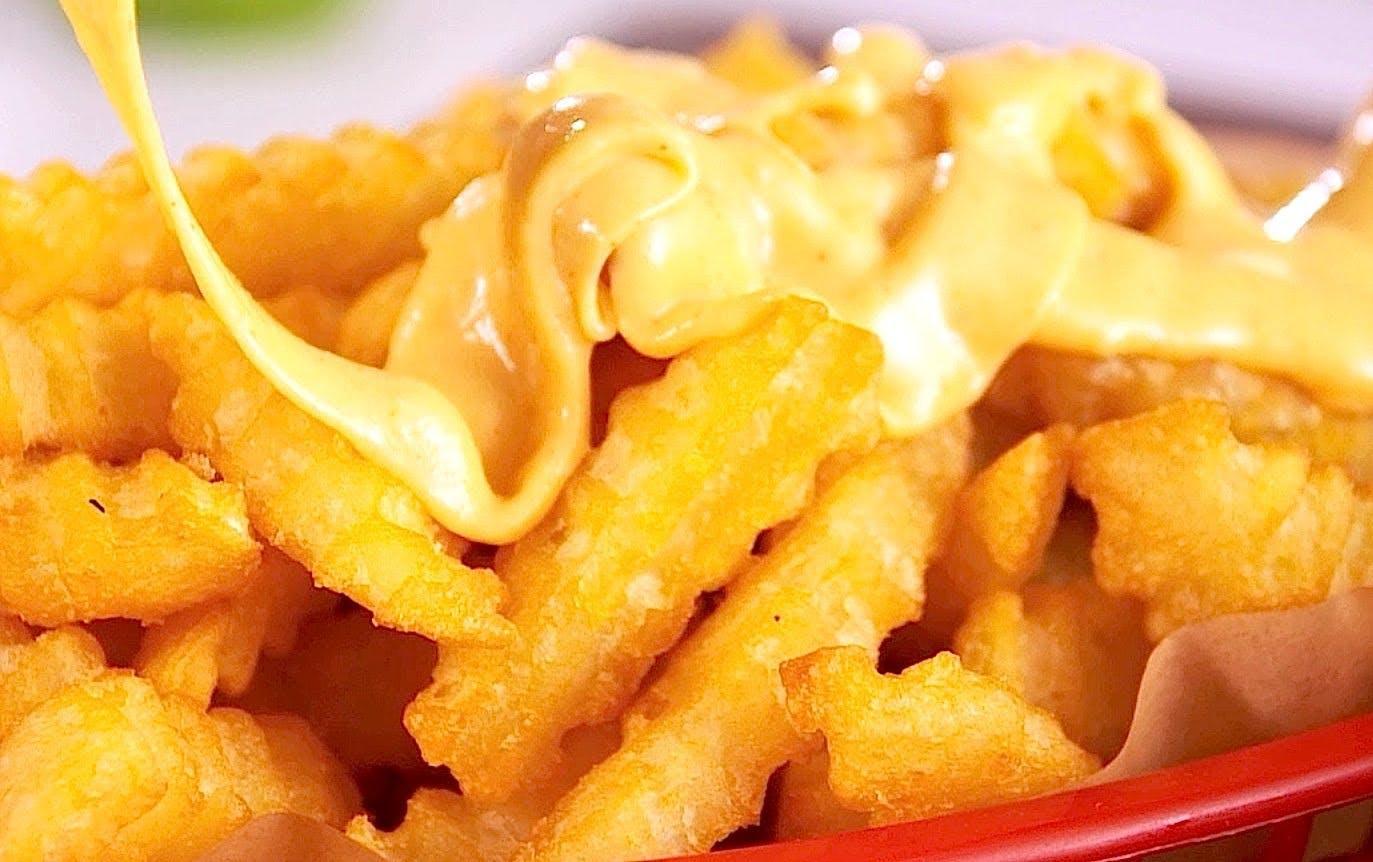 Order Loaded Skinny Cheese Fries - Appetizer food online from Jey Subs & Pizza store, Jessup on bringmethat.com