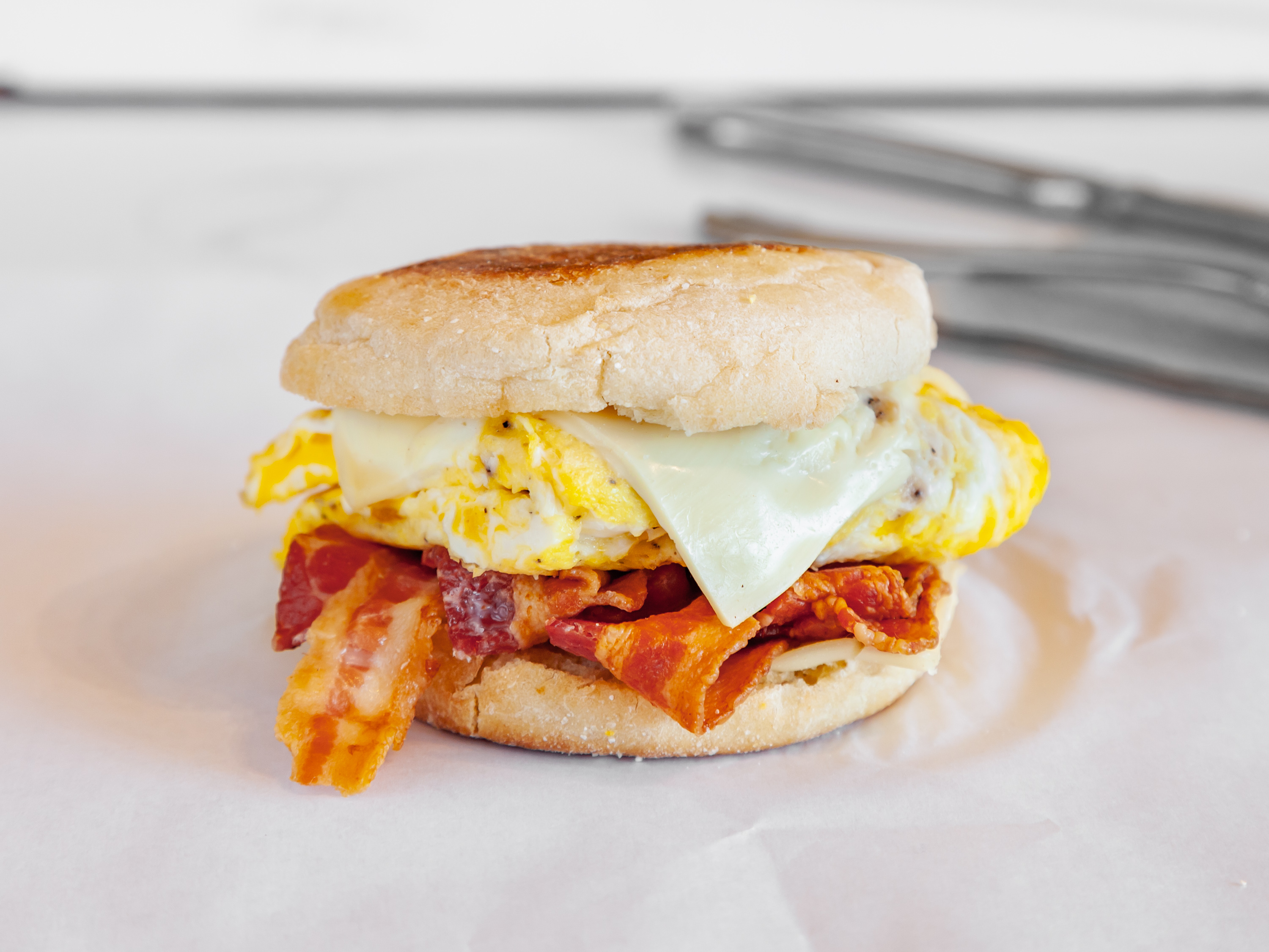 Order Egg, Bacon and Cheese Sandwich food online from Burlap Coffee store, Oakland on bringmethat.com