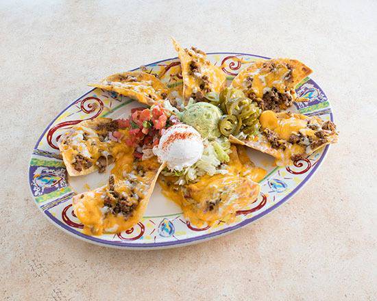 Order Deluxe Nachos food online from Mexican Inn Cafe store, Fort Worth on bringmethat.com