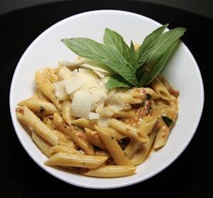 Order Penne Alla Sake food online from Marco Polo's store, Westbury on bringmethat.com