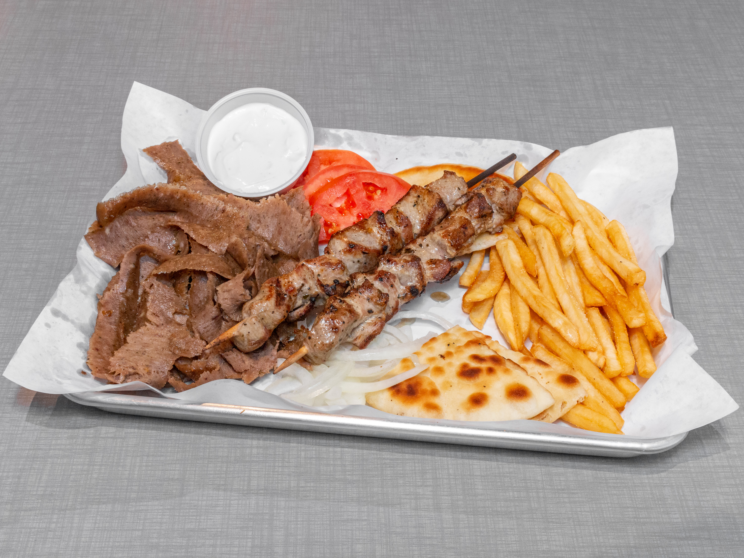 Order Pork Shish-Kebob and Gyros Combo Plate food online from The Works store, Glenview on bringmethat.com