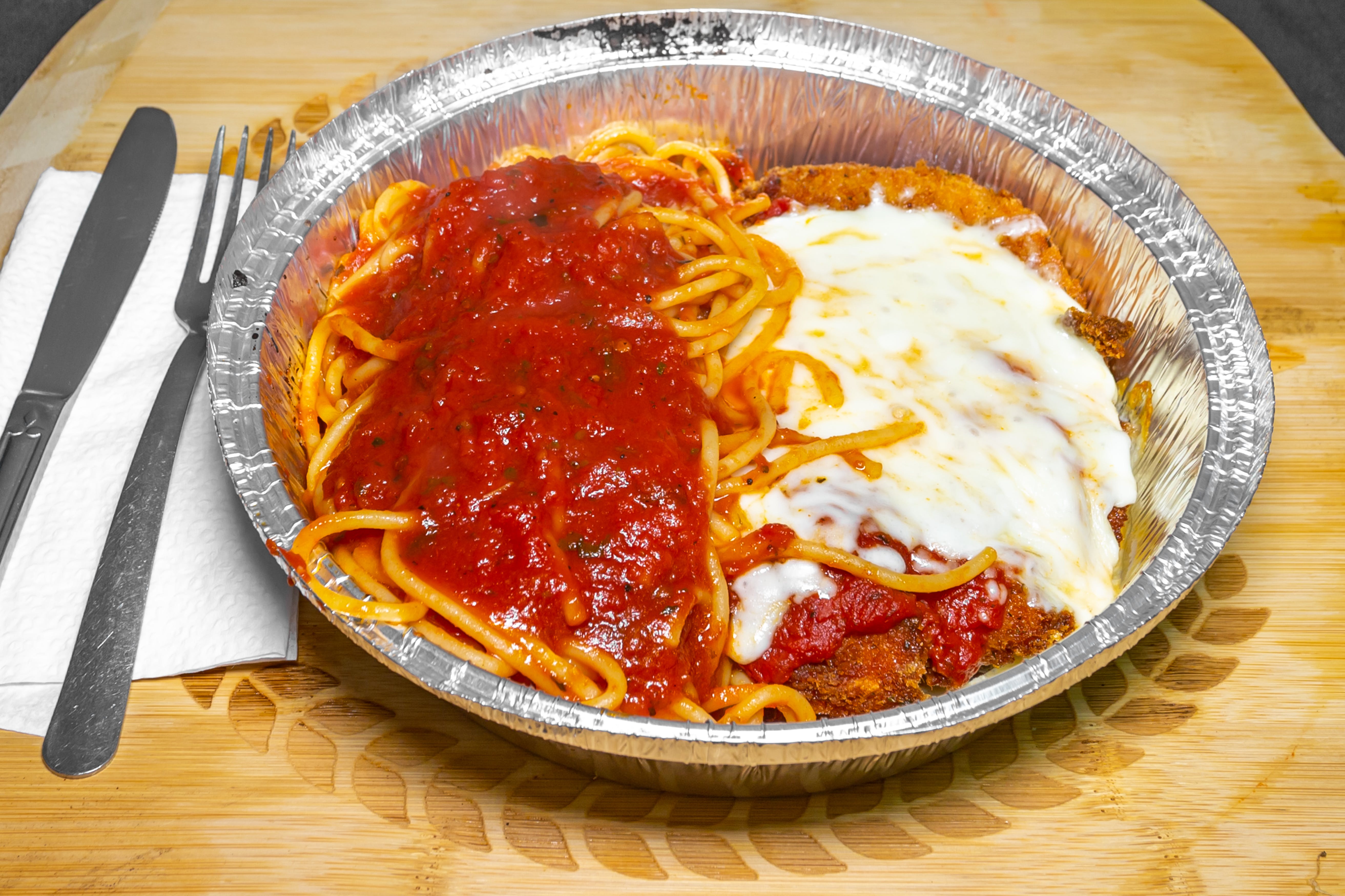 Order Chicken Parmigiana - Entree food online from Pizza D'Oro store, Catasauqua on bringmethat.com
