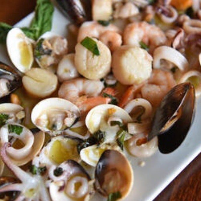 Order Seafood Salad - Appetizer food online from Zio's Pizza store, Allentown on bringmethat.com