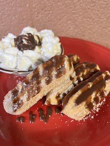 Order Churros food online from Panchos Mexican Restaurant store, Campbellsville on bringmethat.com