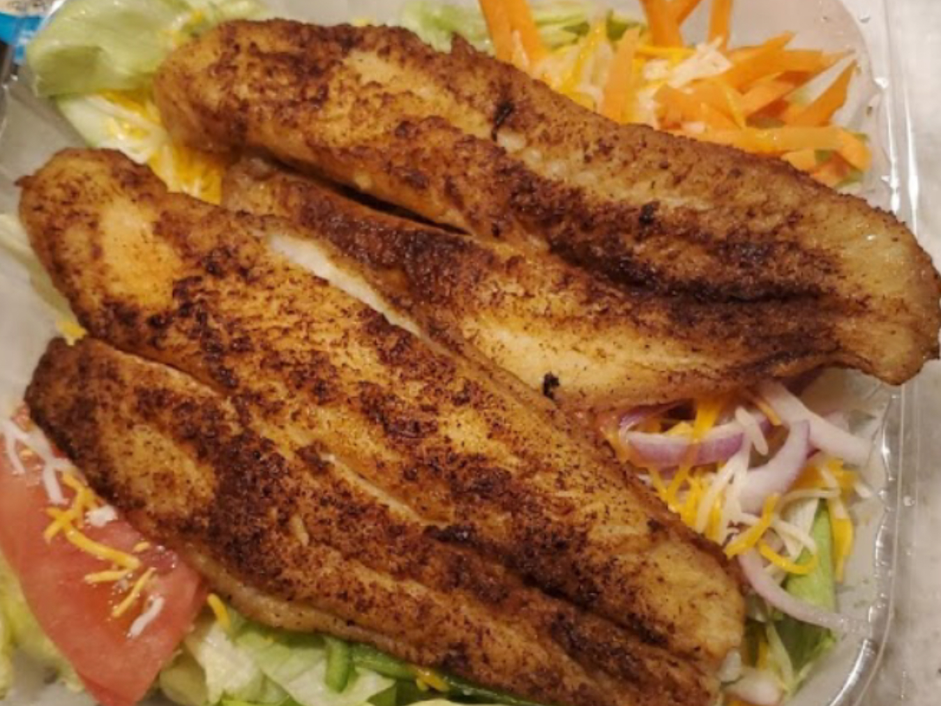 Order 2 Pieces Catfish Grilled food online from Sharks Fish and Chicken store, Baltimore on bringmethat.com