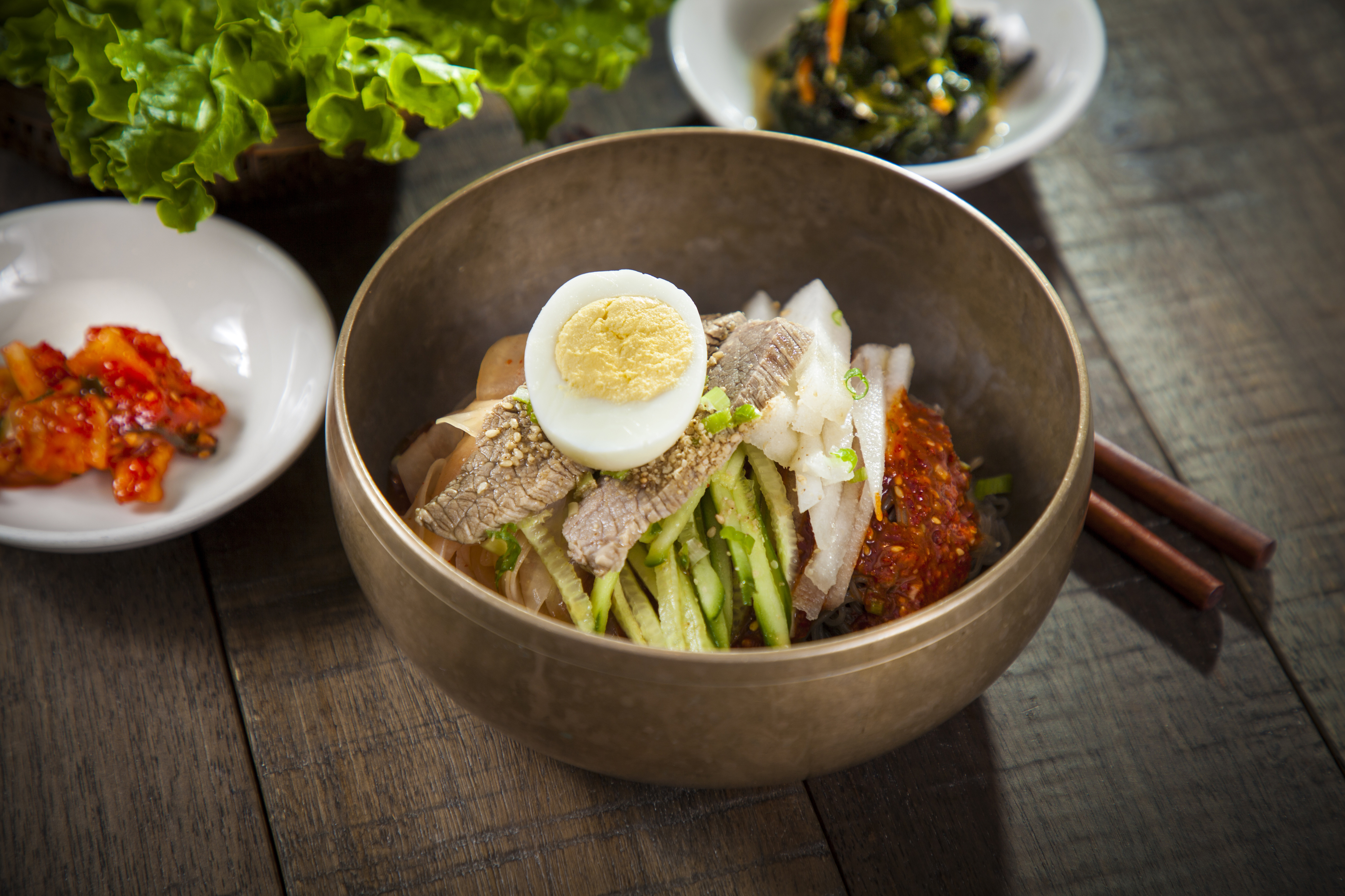 Order Spicy Naengmyeon (Spicy Cold Buckwheat Noodle) - 비빔냉면 food online from Yellow Cow Korean Bbq store, Gardena on bringmethat.com