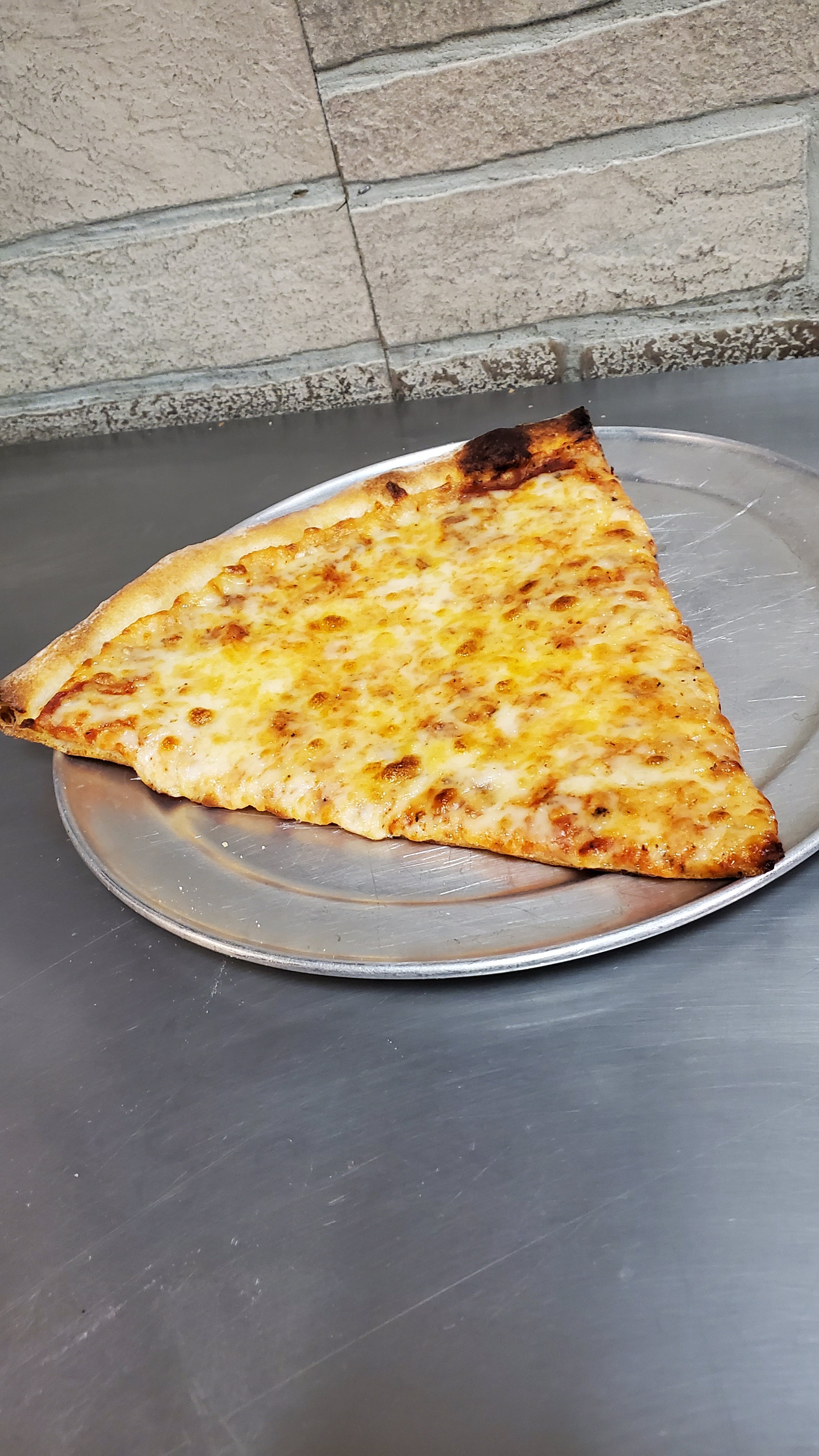 Order Cheese Pizza Slice - Slice food online from Taste of Italy Pizza and Pasta store, Goodyear on bringmethat.com