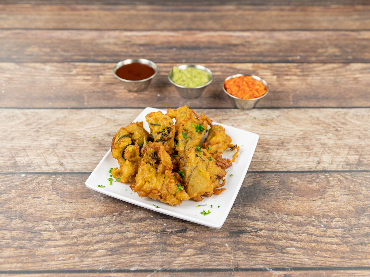 Order Vegetable Pakora food online from Sher-A-Punjab store, Quincy on bringmethat.com