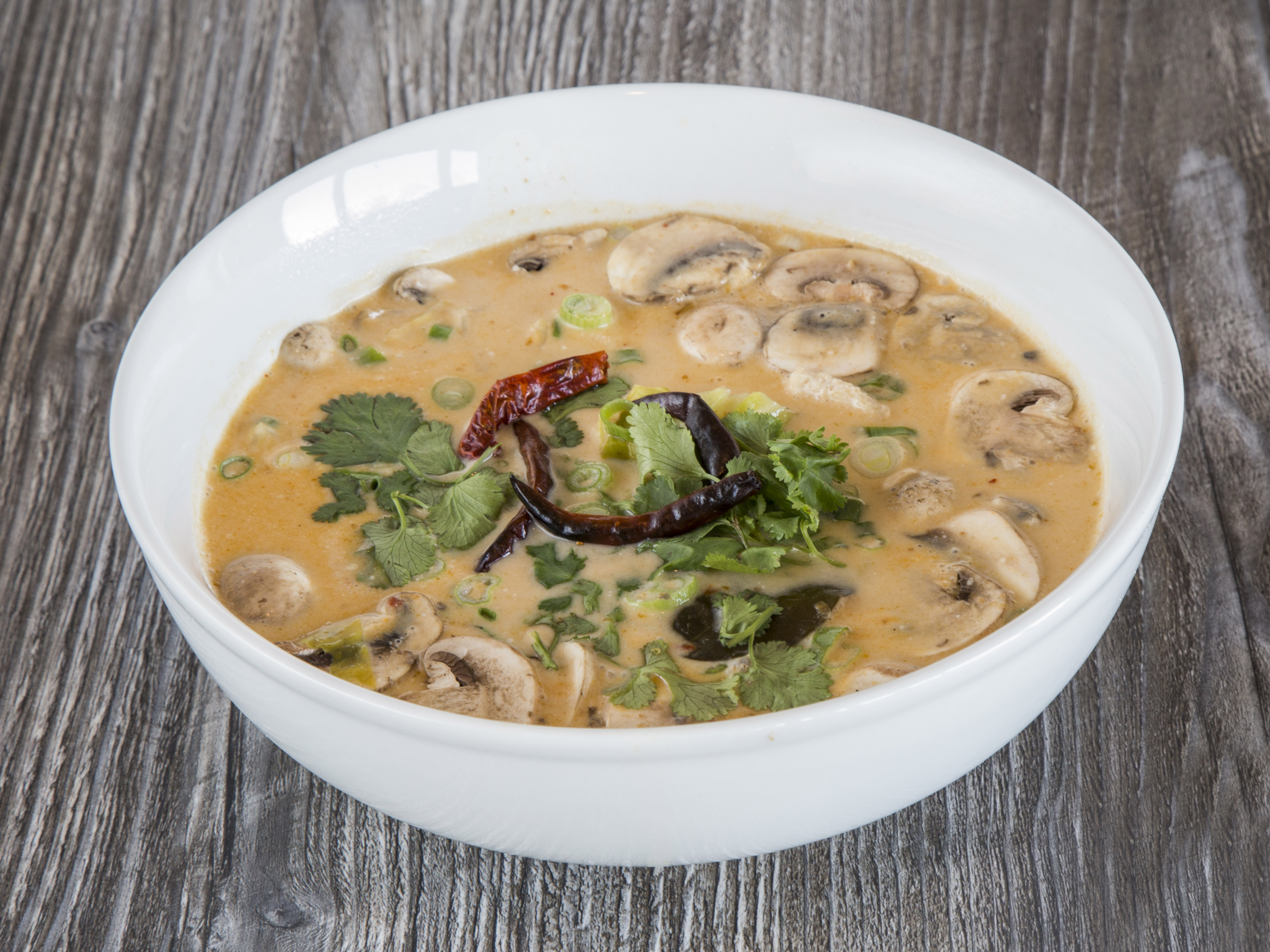 Order 29. Bowl of Tom Kha Soup food online from Thai Delight store, Phoenix on bringmethat.com