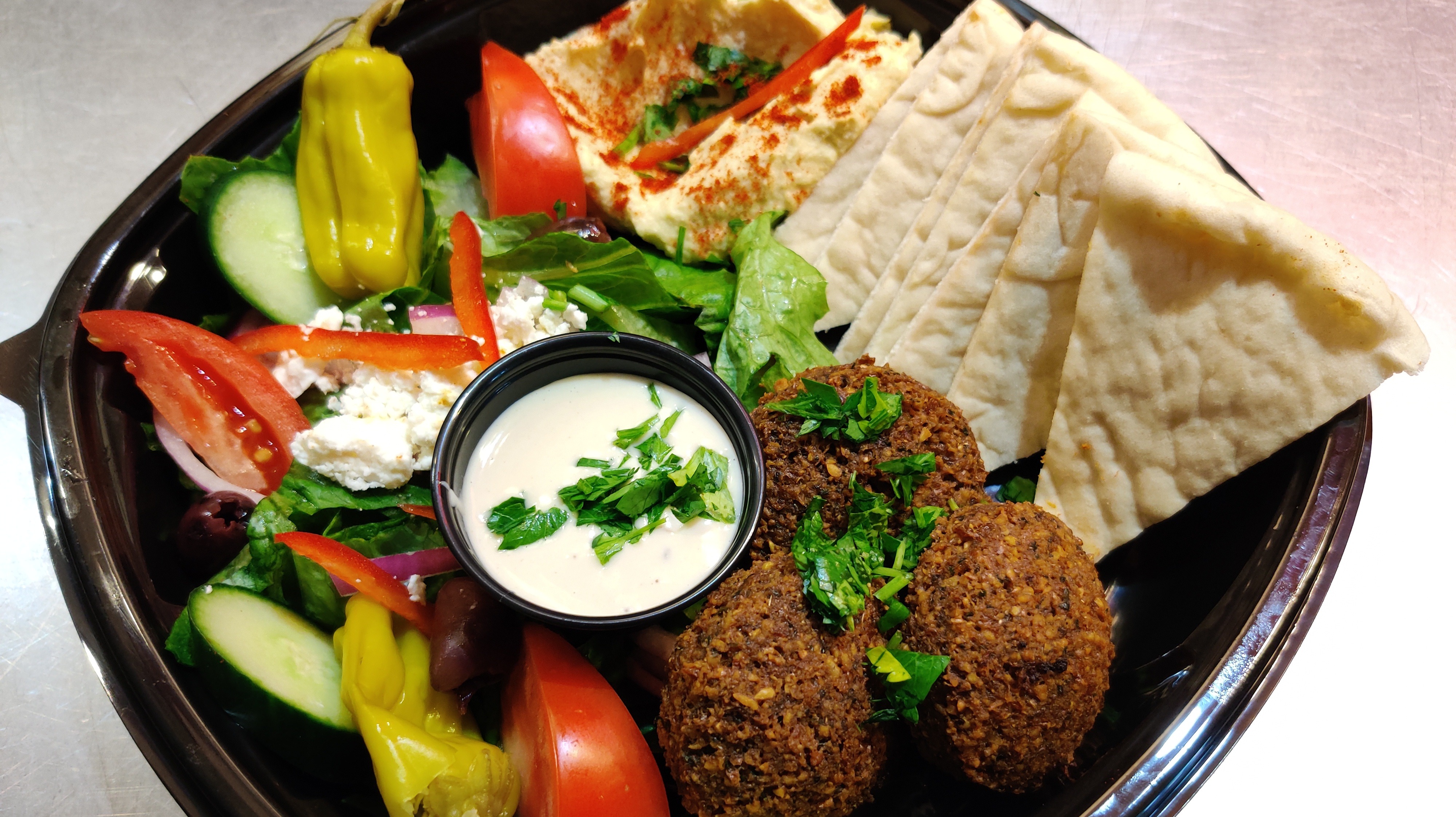 Order 6. Falafel Lunch Box food online from Trieste Cafe store, Minneapolis on bringmethat.com