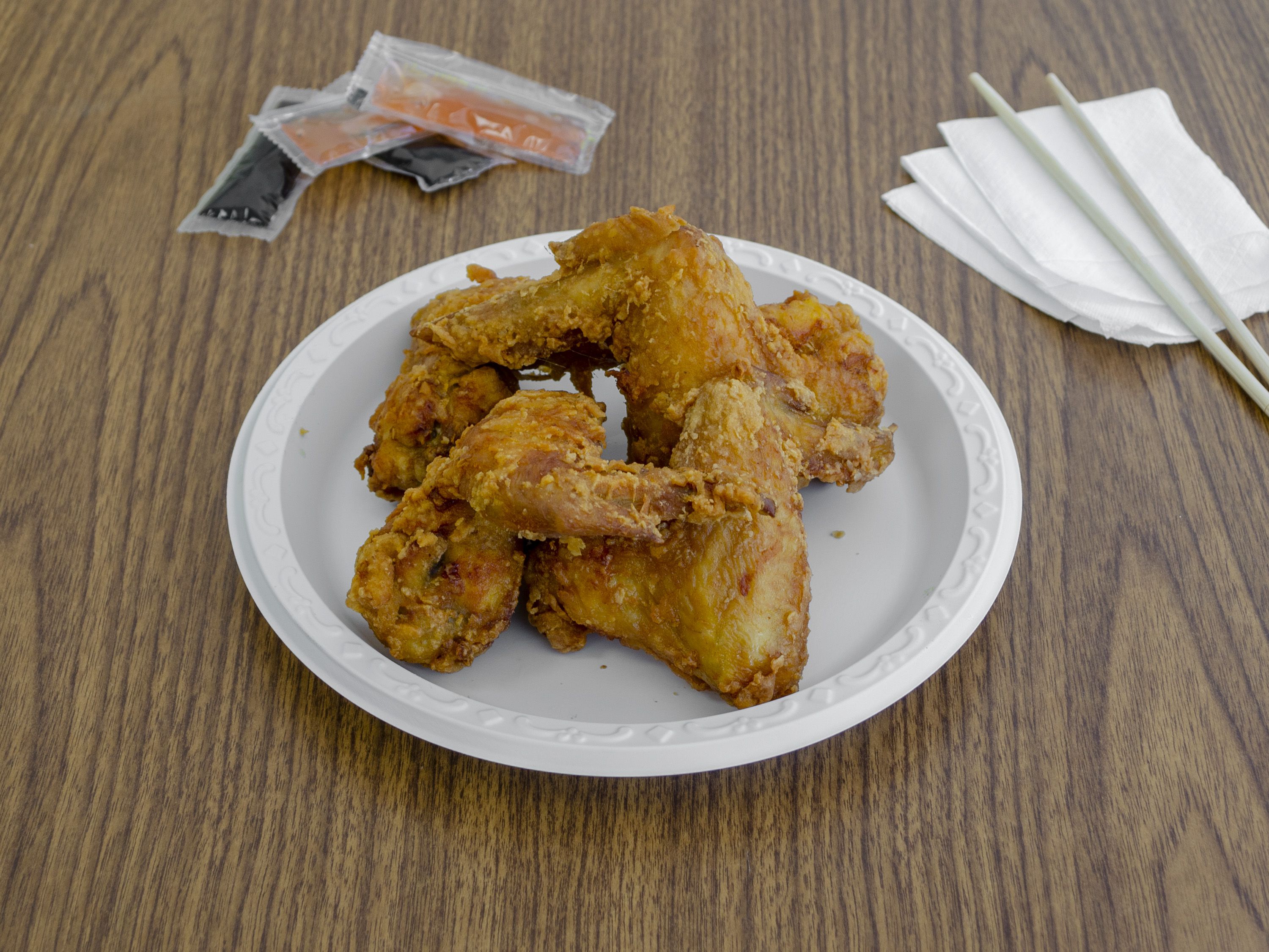 Order 2. Fried Chicken Wings food online from New China Restaurant store, Huntington on bringmethat.com