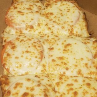 Order Tomato Bread food online from Pisanello's Pizza store, Bowling Green on bringmethat.com