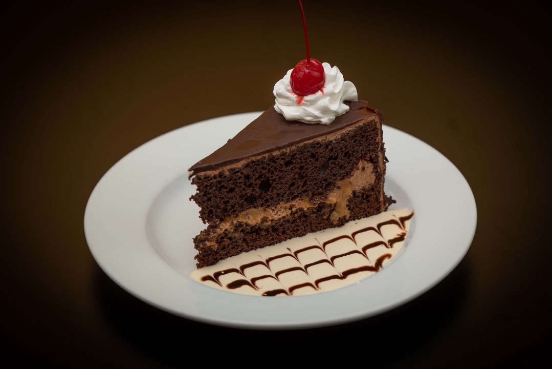 Order Chocolate cake food online from Delicias Del Jireh Peruvian Kitchen store, White Plains on bringmethat.com