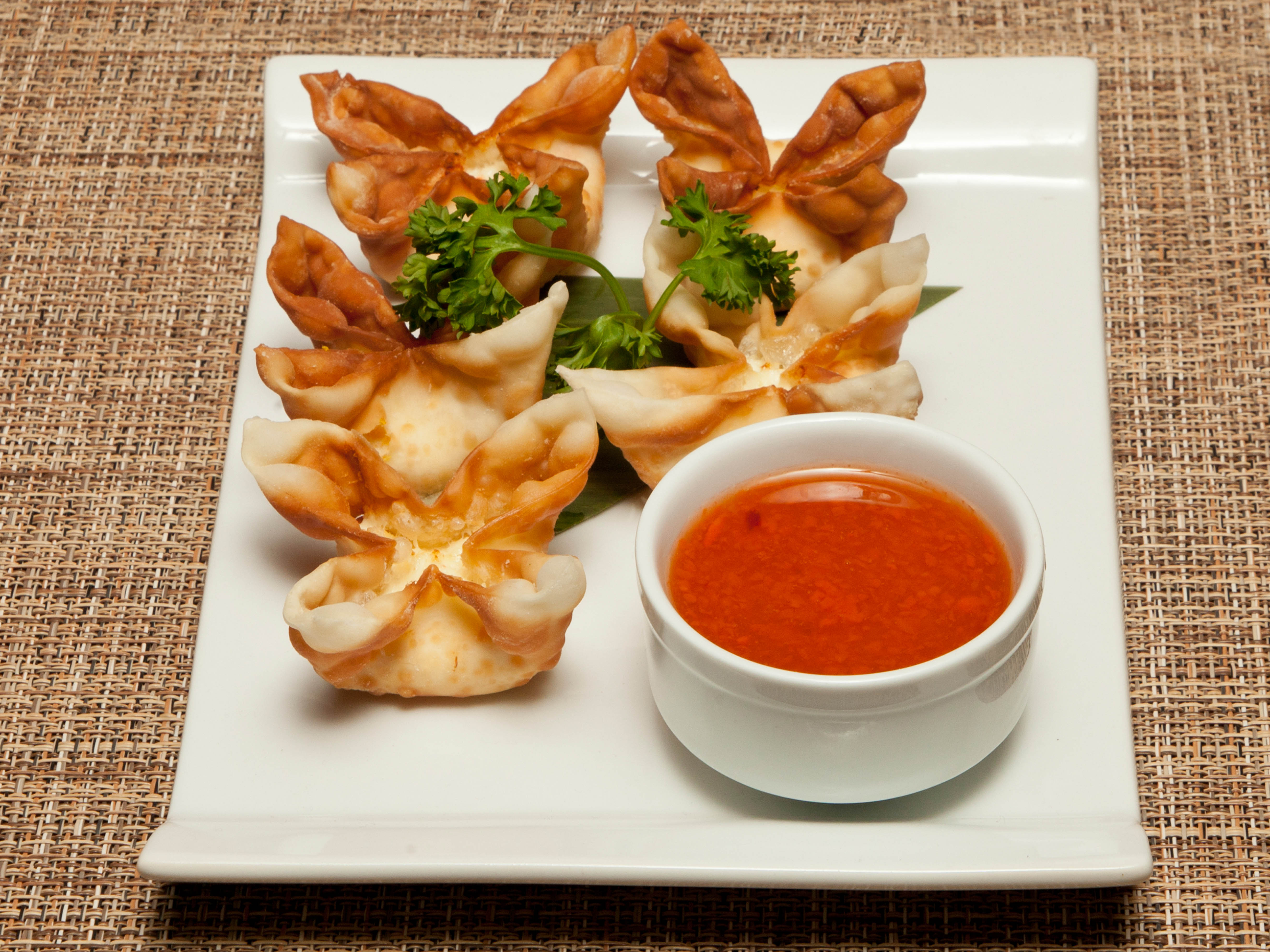 Order A7. Crab Rangoon food online from Baan Thai Restaurant store, Las Vegas on bringmethat.com
