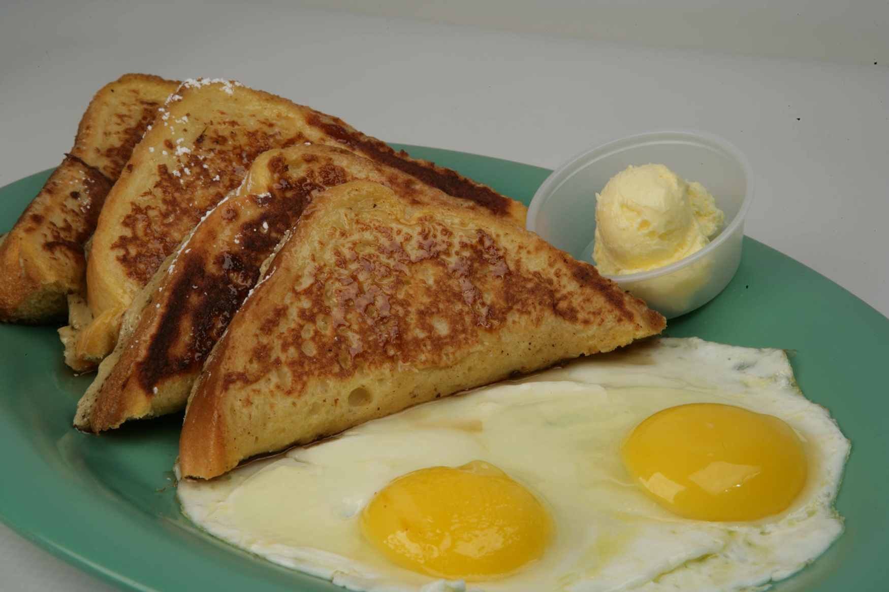 Order French Toast and Eggs food online from Rodeo Mexican Grill store, Los Angeles on bringmethat.com