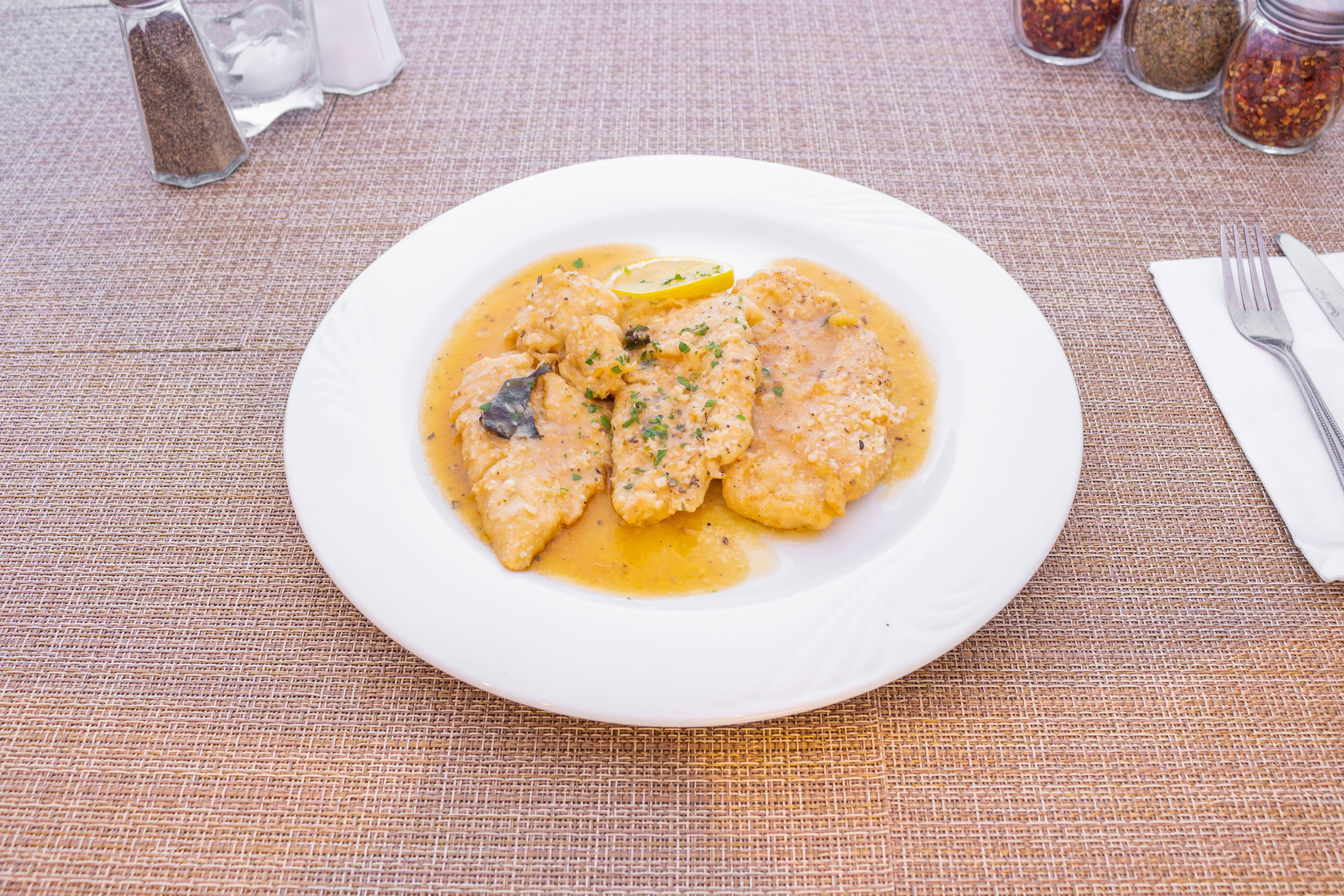 Order Chicken Francese - Entree food online from Pizza Man Trattoria Italiano store, Pompton Plains on bringmethat.com