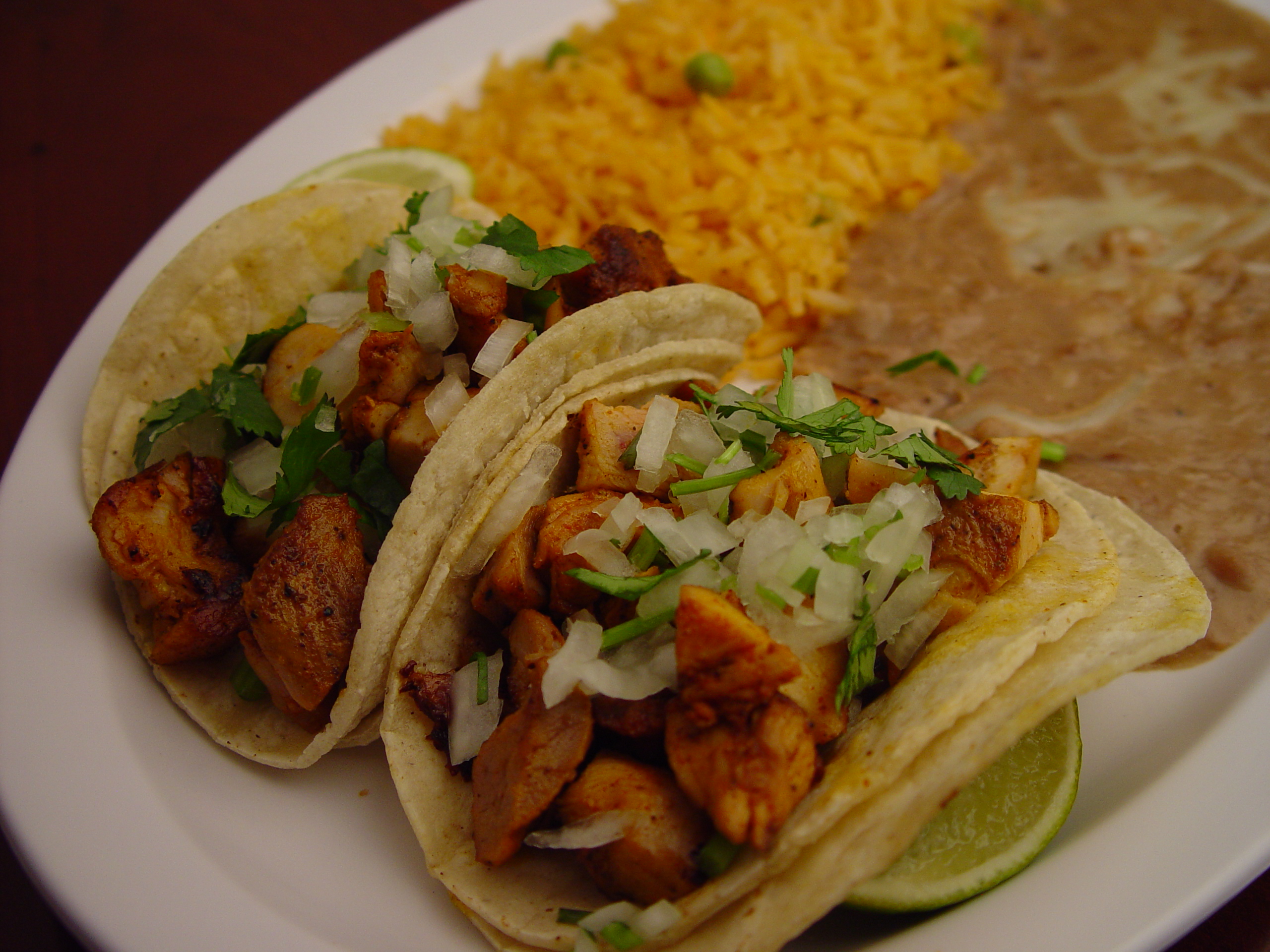 Order 23. 2 Tacos Plate food online from Rodeo Mexican Grill store, Los Angeles on bringmethat.com
