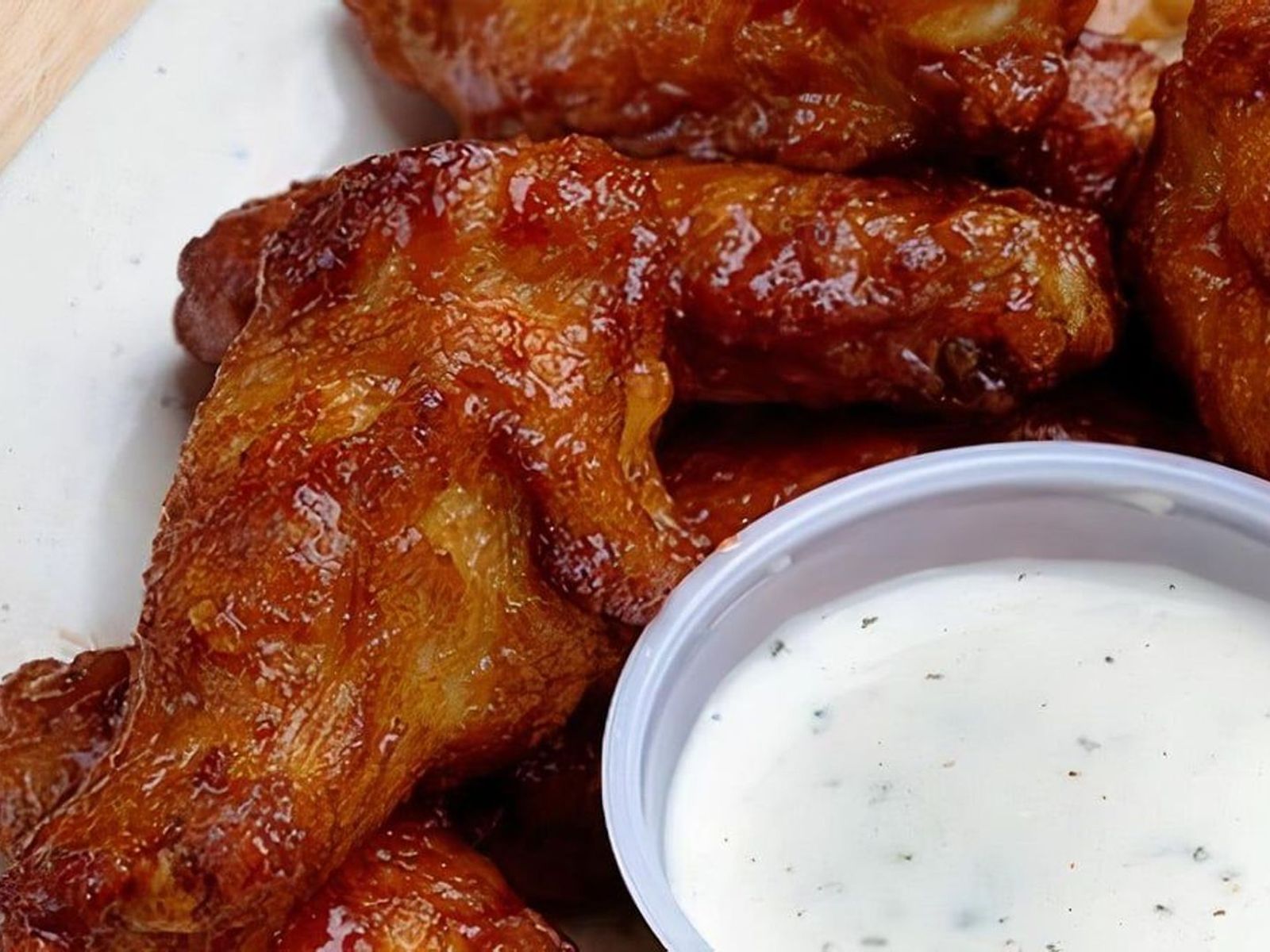 Order Texas BBQ Wings food online from Pepperoni's Pizza store, Fulshear on bringmethat.com