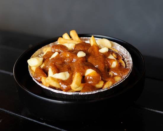Order DWC Poutine food online from Detroit Wing Company store, Southfield on bringmethat.com