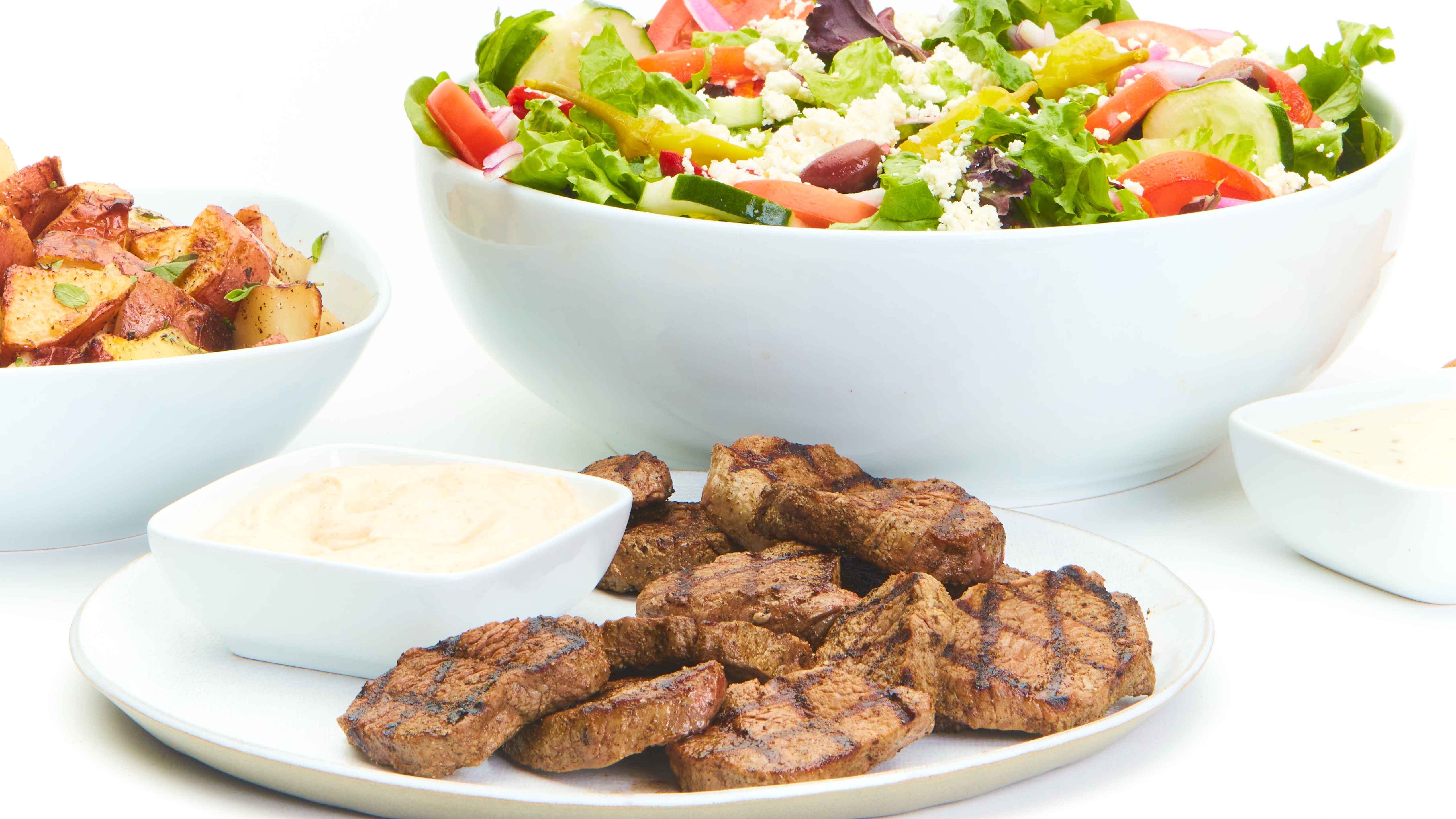 Order Grilled Beef Feast for 6 food online from Taziki's Mediterranean Cafe store, Charlotte on bringmethat.com