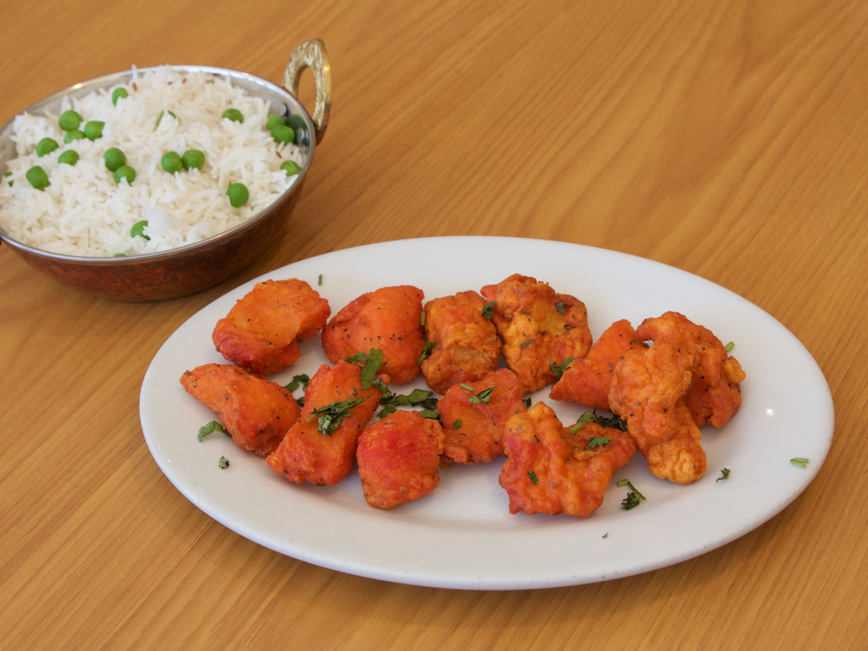 Order 4. Fish Pakora food online from Maharaja Indian Cuisine store, Stockton on bringmethat.com