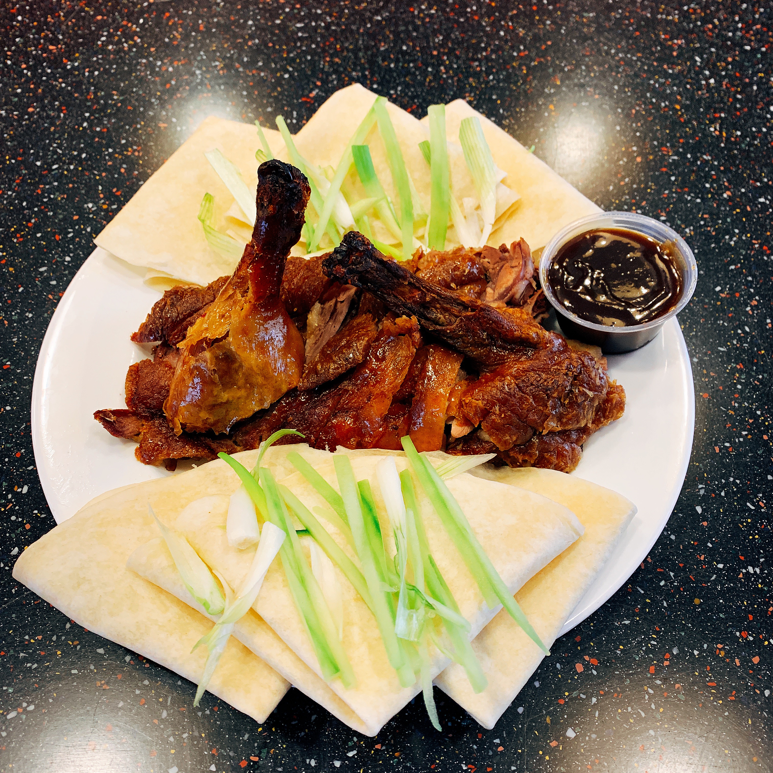 Order 186. Peking Duck food online from Ollie's To Go store, New York on bringmethat.com