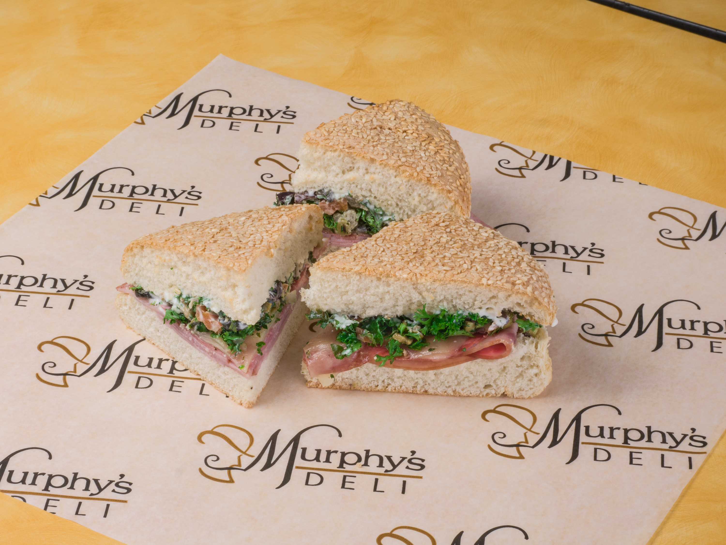 Order Half Muffaletta food online from Murphy's Deli store, The Woodlands on bringmethat.com