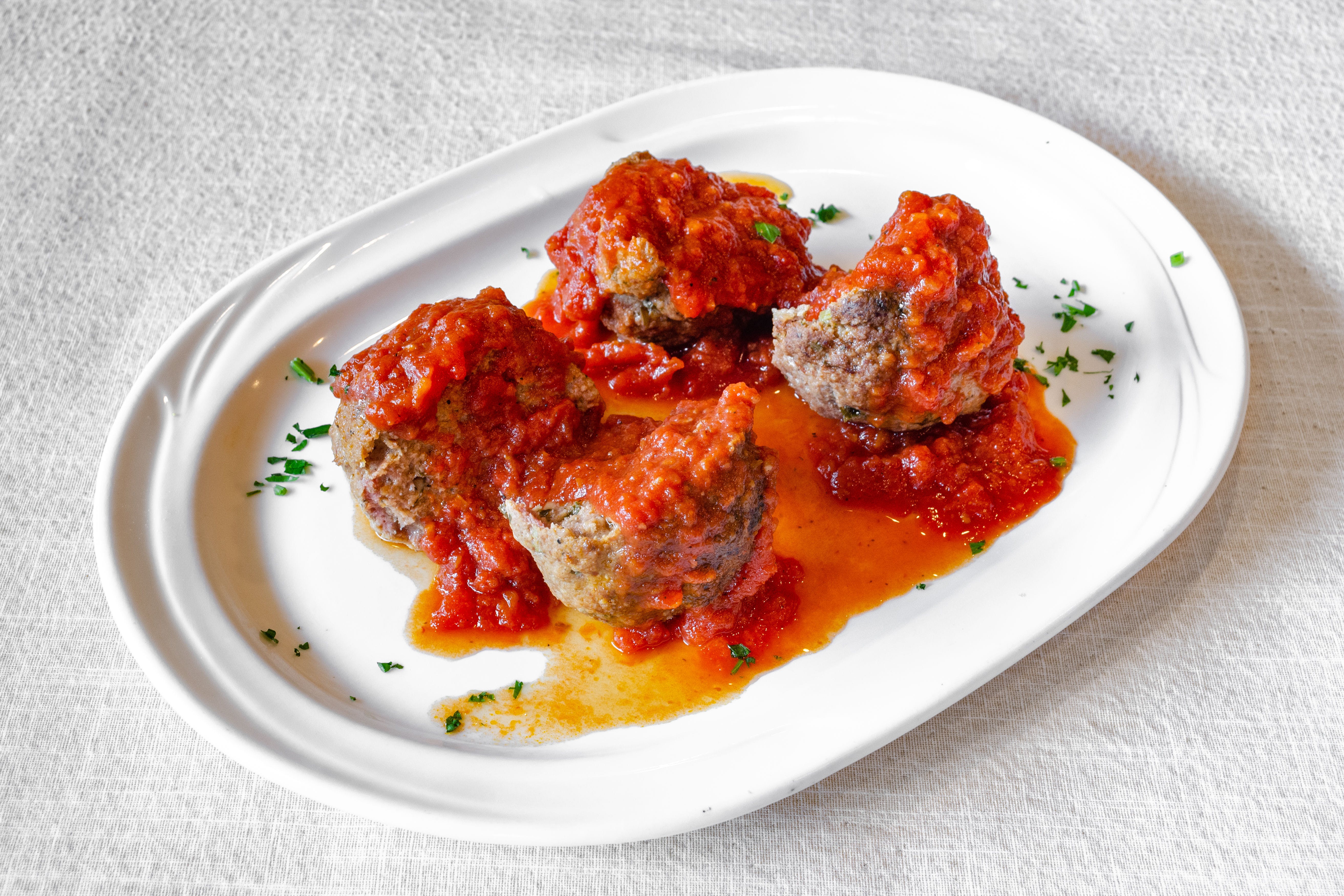 Order Side of Meatballs - Side food online from Puzo's Family Restaurant store, Ridgewood on bringmethat.com