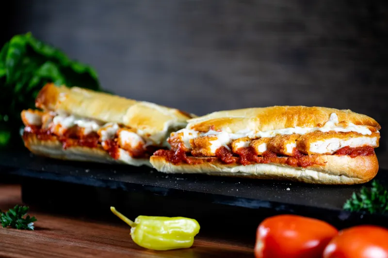 Order 12" Chicken Parm Toasted Hero Sandwich food online from Ski and Benny Pizza store, Anchorage on bringmethat.com