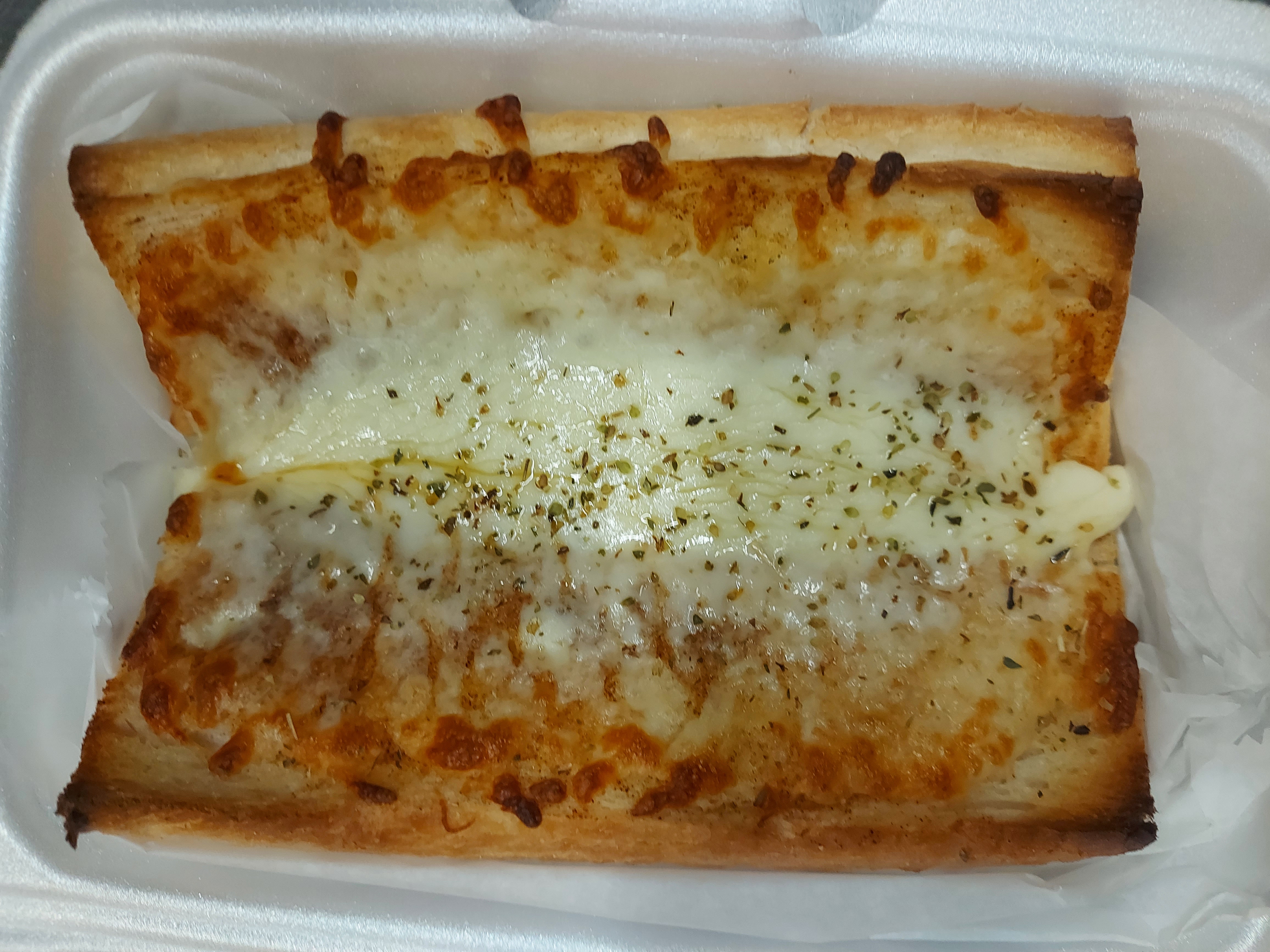 Order Cheesy Garlic Bread food online from Village Pizza store, Chicago on bringmethat.com