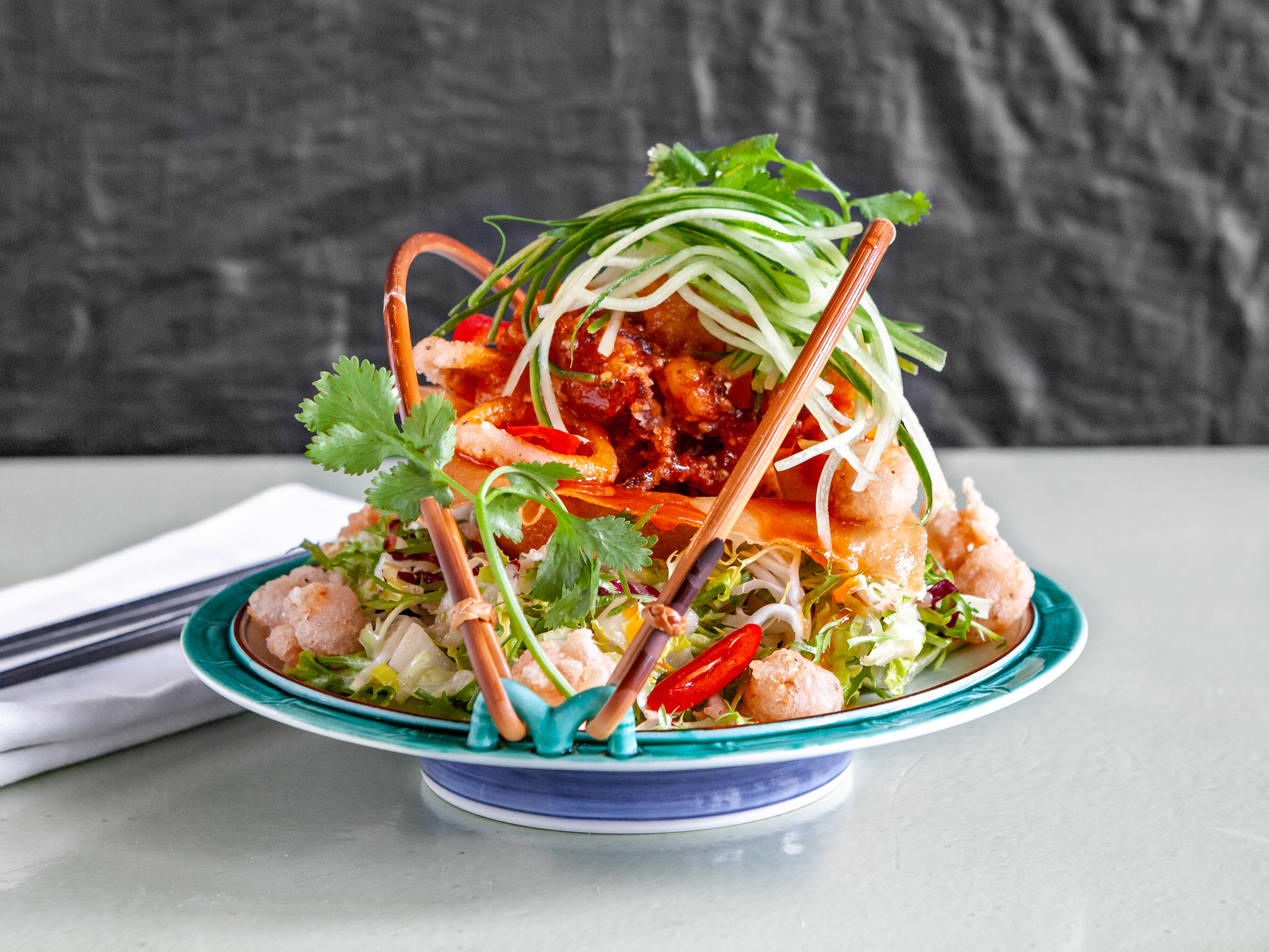 Order Sizzling Calamari & Rock Shrimp Salad food online from Chinois on Main store, Santa Monica on bringmethat.com