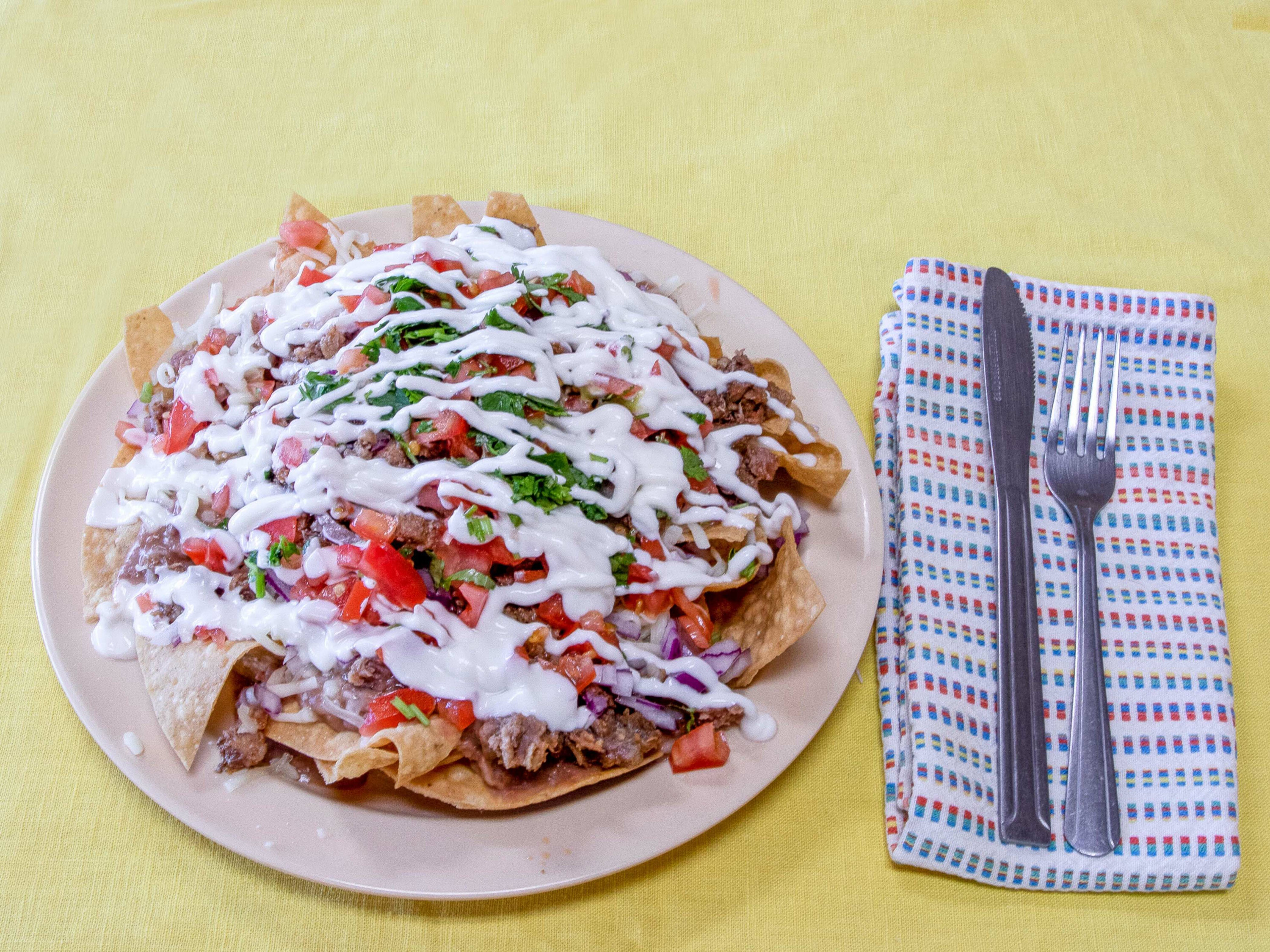 Order Asada Nachos food online from Don Lencho's Authentic Mexican Food store, West Covina on bringmethat.com