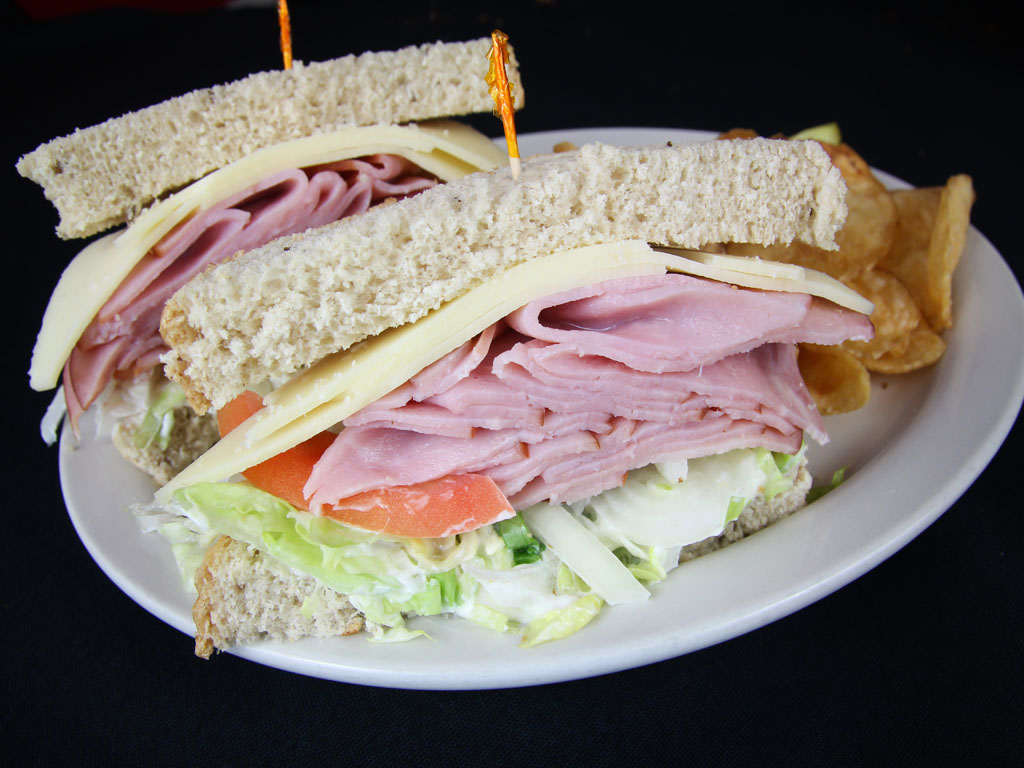 Order Ham and Swiss on Rye Sandwich food online from The Thurman Cafe store, Columbus on bringmethat.com