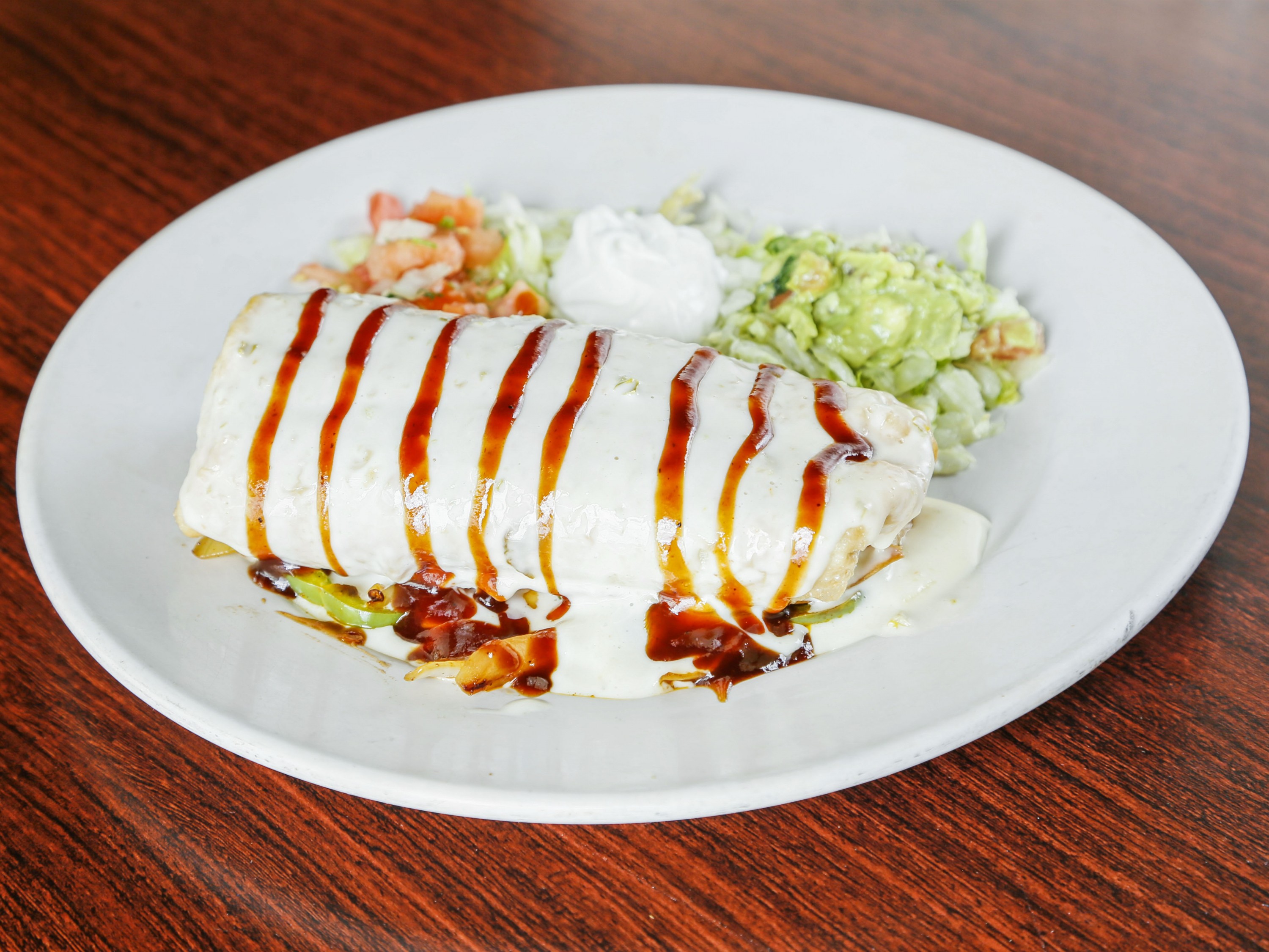 Order BBQ Chimichanga food online from Los 3 Compadres store, Weldon Spring on bringmethat.com
