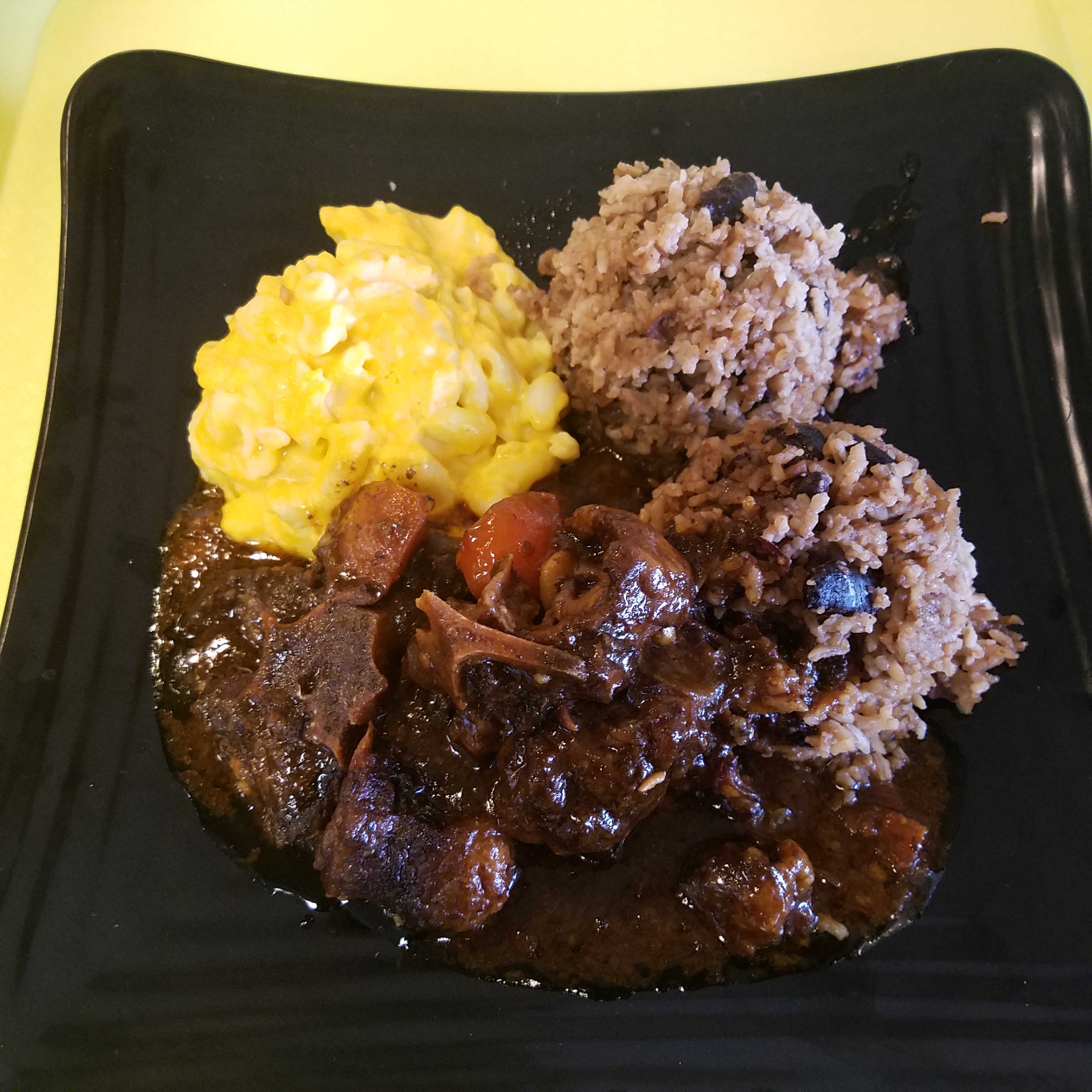 Order Home Run Braised Oxtail ＆ Beans* food online from Jamaican Jerk & Bbq store, Denver on bringmethat.com