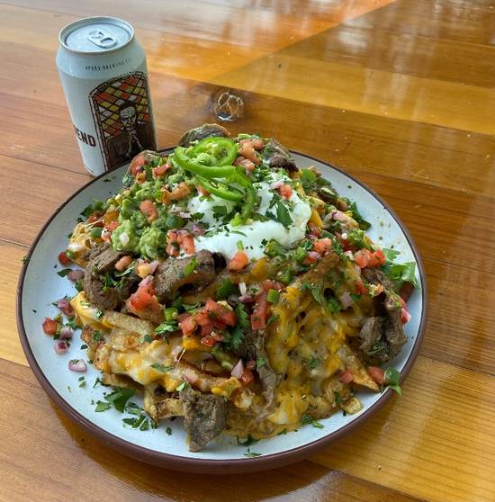 Order Carne Asada Fries food online from Flying Saucer Draught Emporium store, Memphis on bringmethat.com