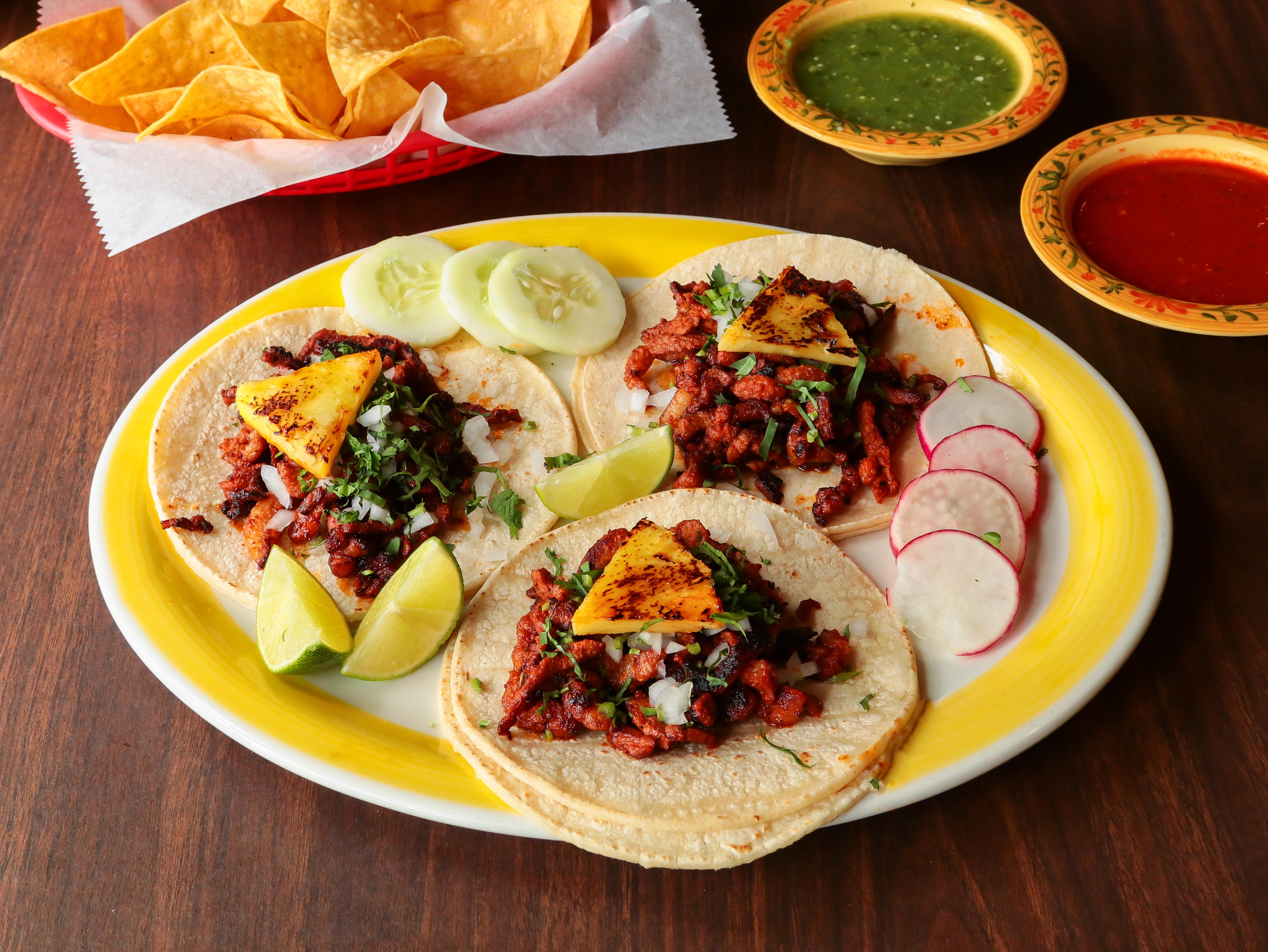 Order Al Pastor Tacos food online from Plaza Garibaldi store, Philadelphia on bringmethat.com