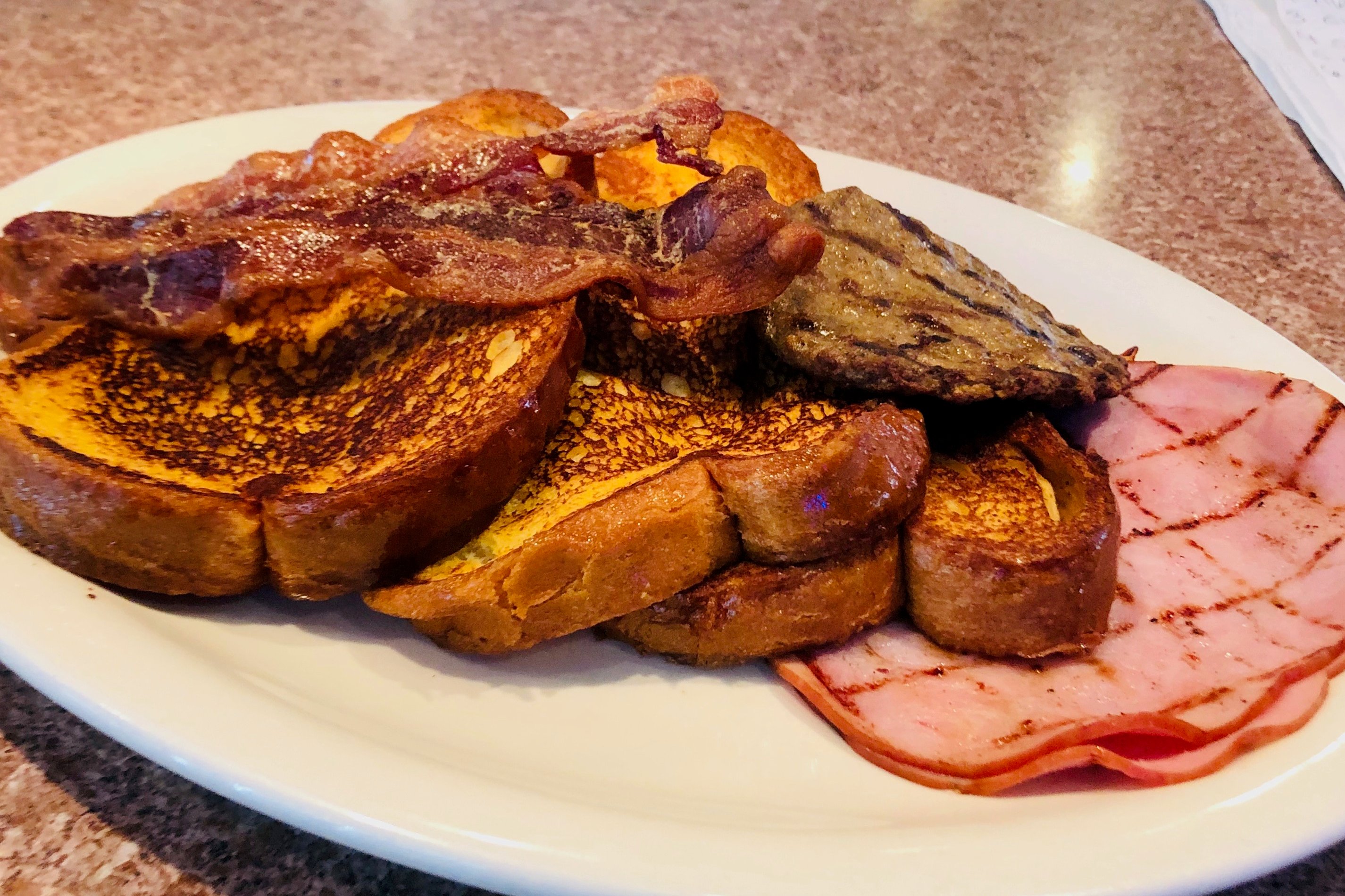 Order French Toast Deluxe food online from Sandy Springs Diner store, Atlanta on bringmethat.com