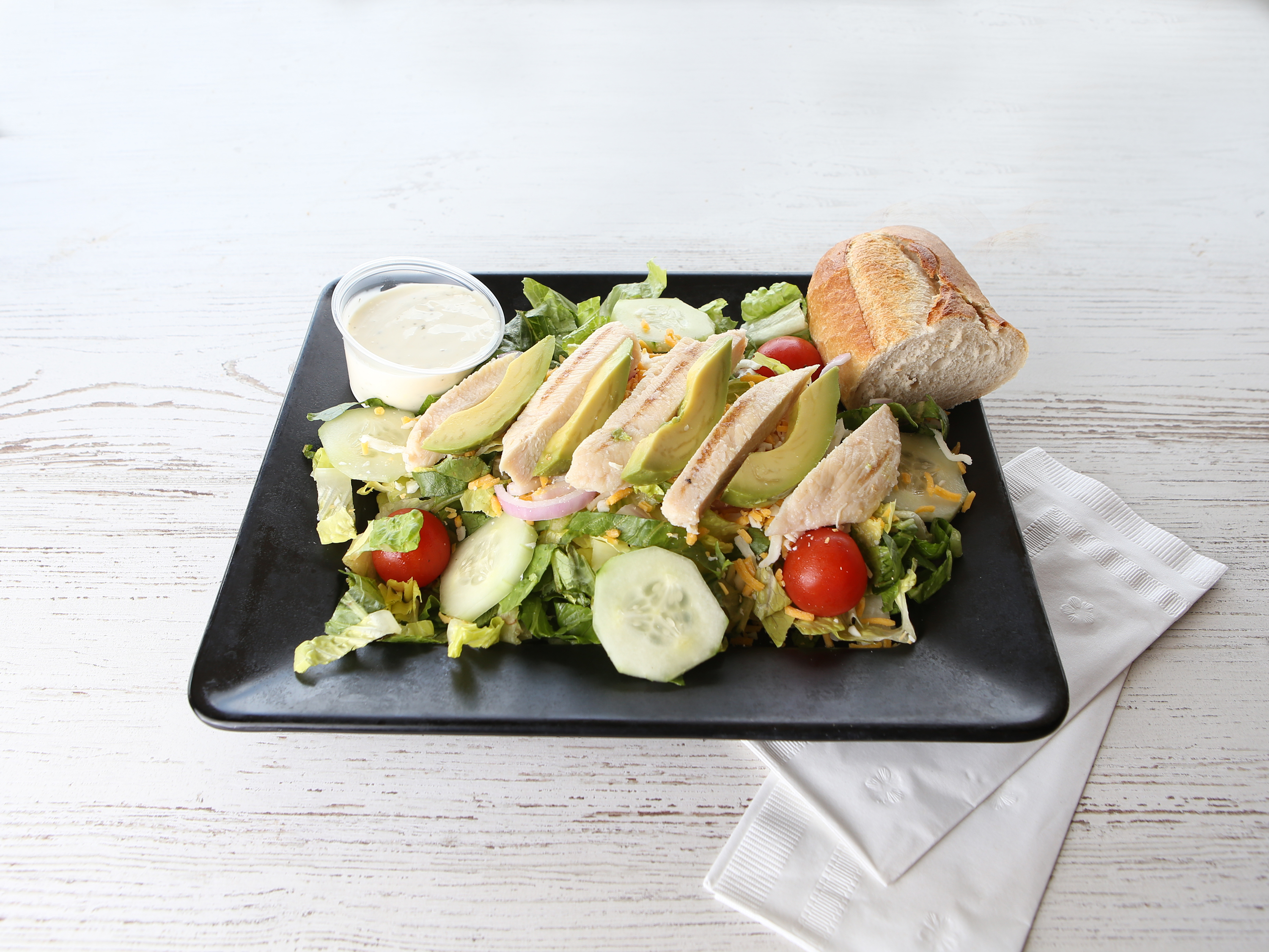 Order Grilled Chicken Avocado Salad food online from Peaberry Cafe And Bakery store, Youngstown on bringmethat.com