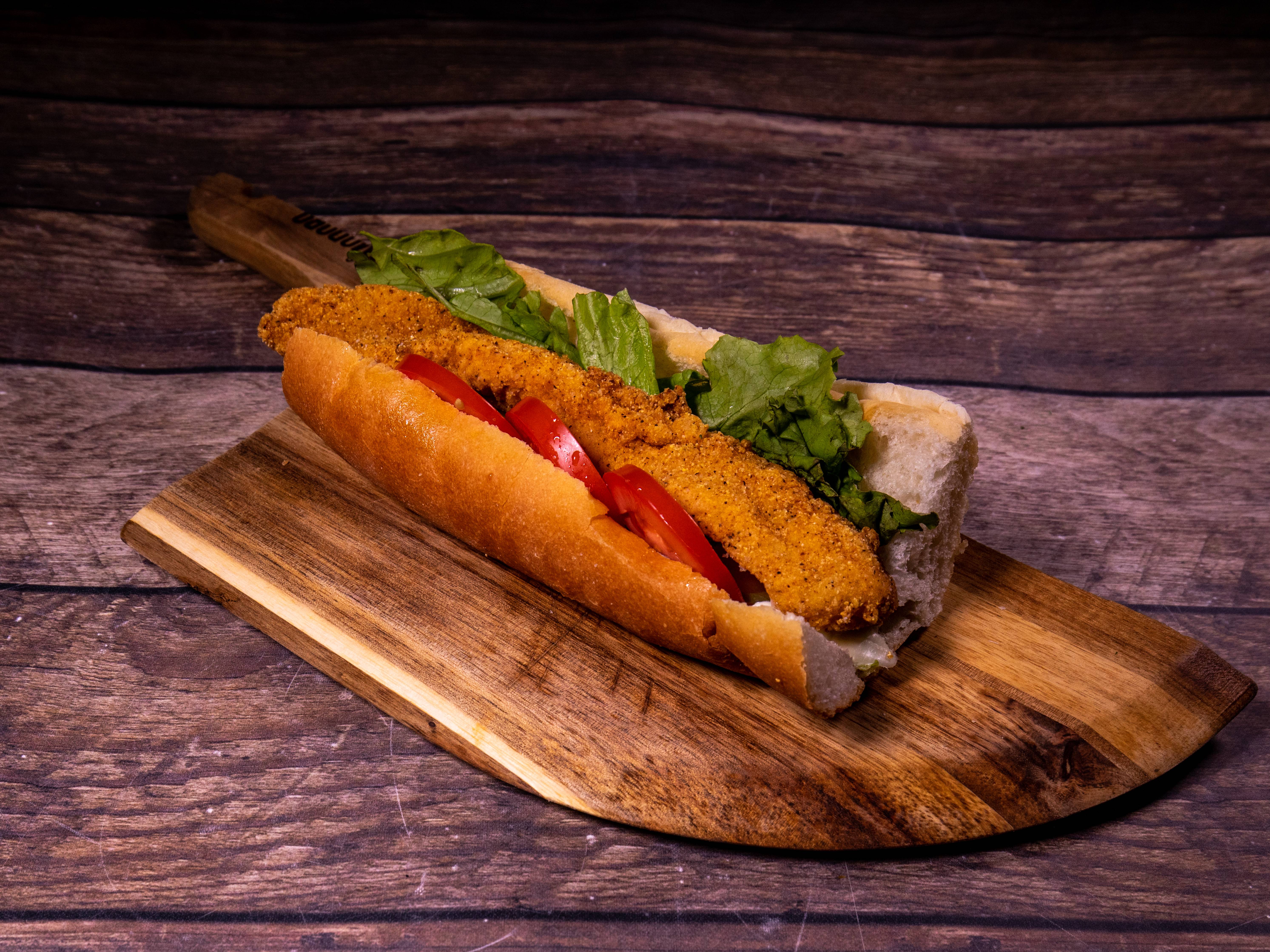Order Fish Po-Boy food online from Frenchy Chicken store, Houston on bringmethat.com