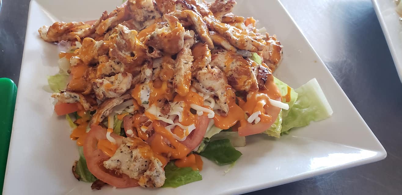 Order Buffalo Grilled Chicken Salad - Salads food online from Amy's Family Pizzeria store, Hatboro on bringmethat.com