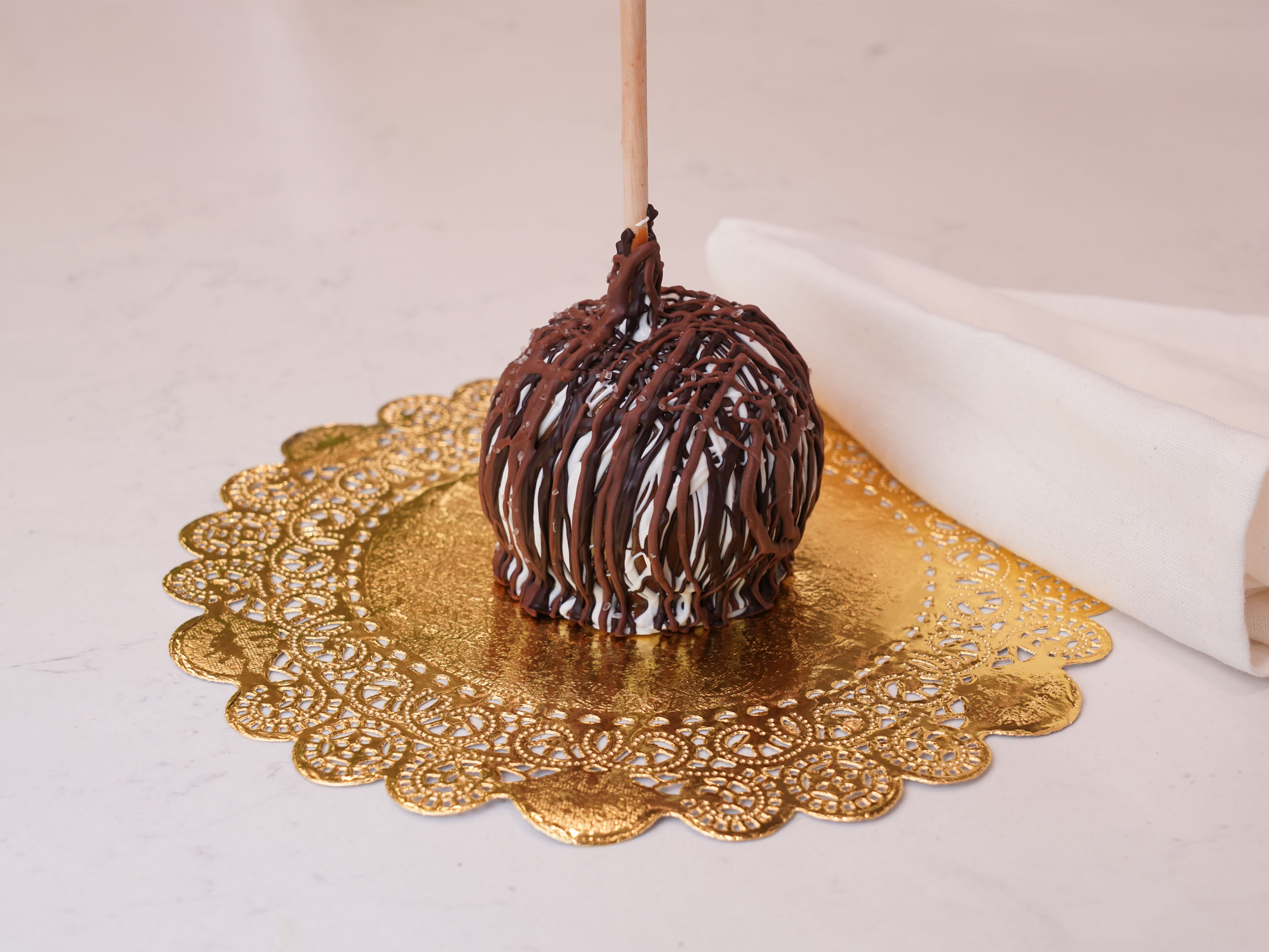 Order Chocolate Sea Salt Caramel Apple food online from Chocolate Wishes And Treats store, Clovis on bringmethat.com