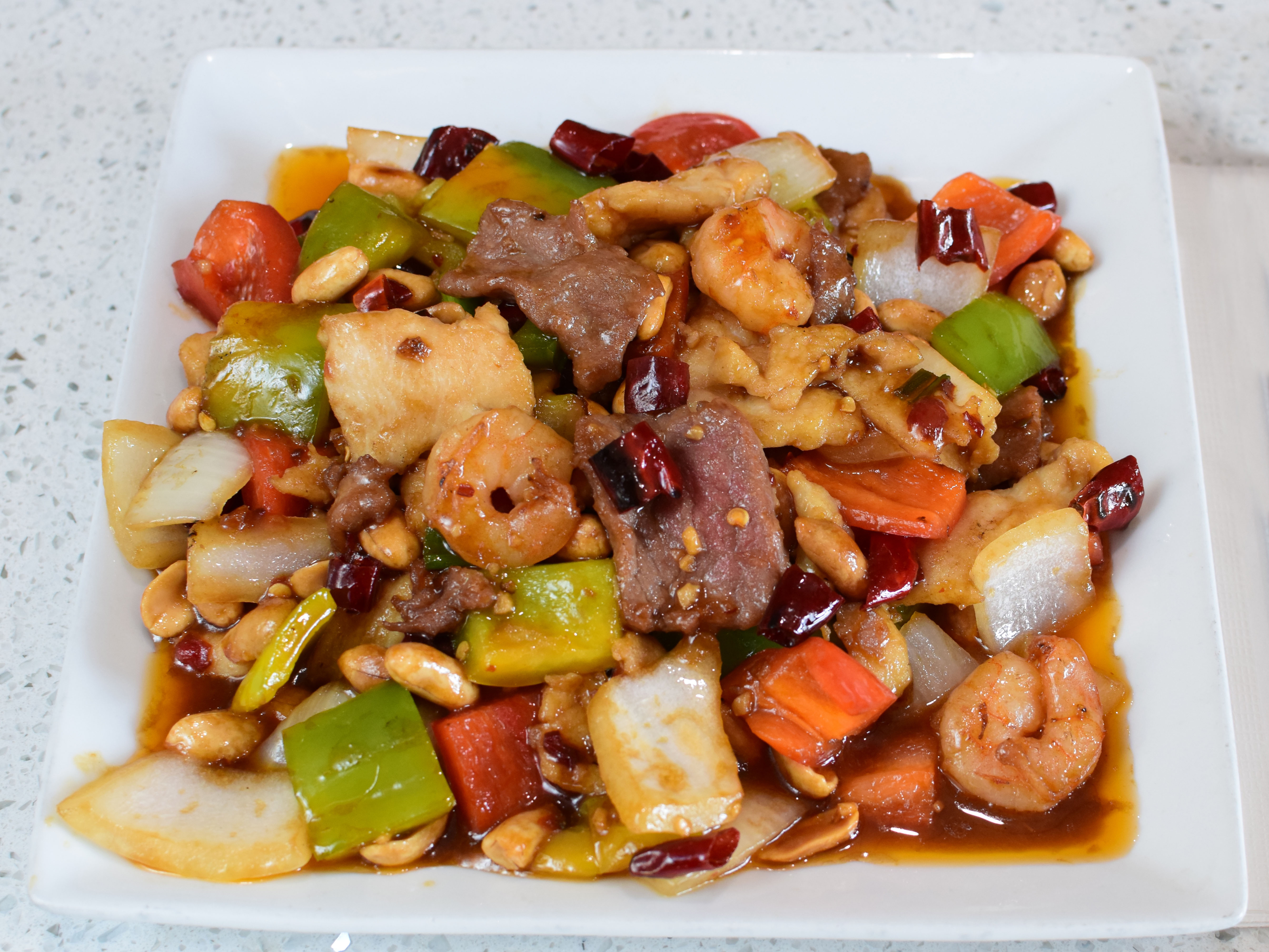 Order 84. Kung Pao Triple Delight food online from Venus Cafe store, Covina on bringmethat.com