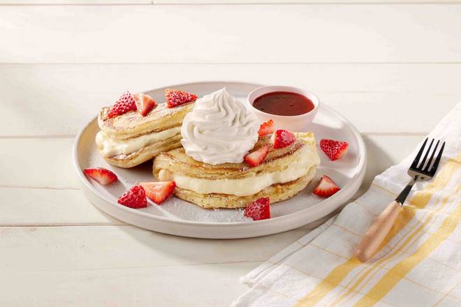 Order Stuffed Cheesecake Pancakes – Two food online from Cracker Barrel store, Little Rock on bringmethat.com