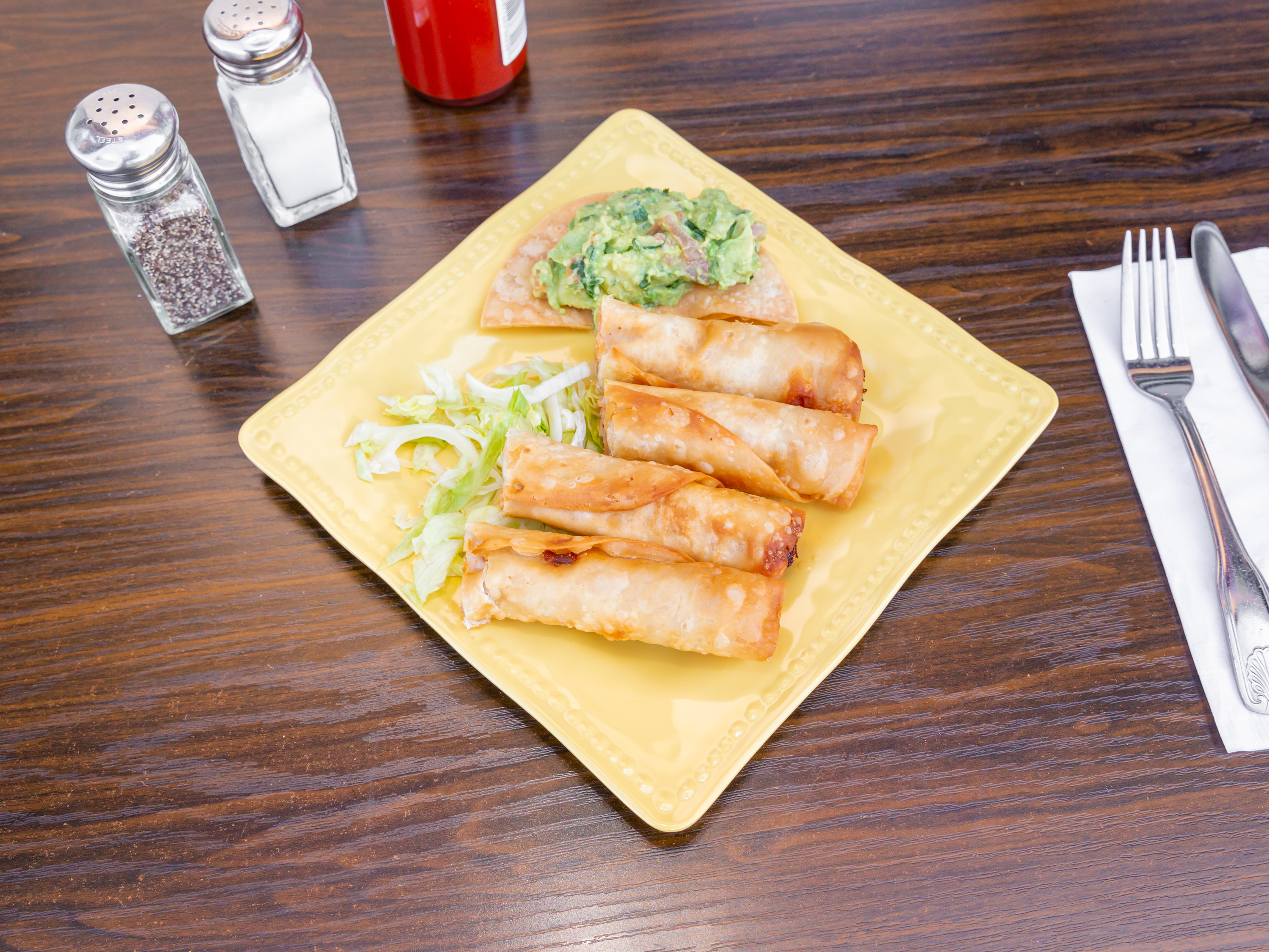 Order 14. Two Chicken Flautas with Guacamole Combo food online from Burnt Tortilla store, Gardena on bringmethat.com
