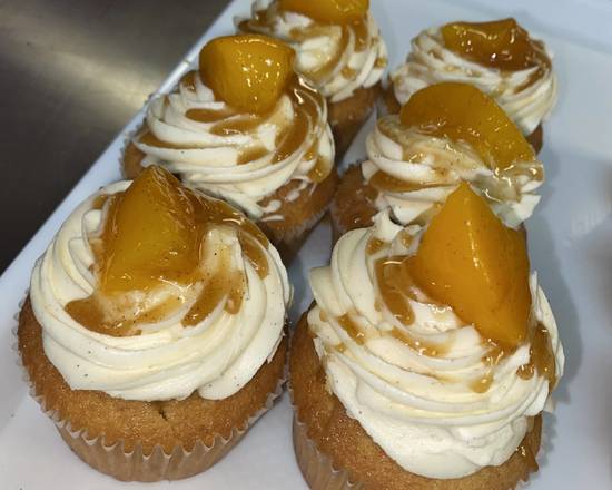 Order Peach cobbler cupcake food online from Amazcakes store, Chicago on bringmethat.com