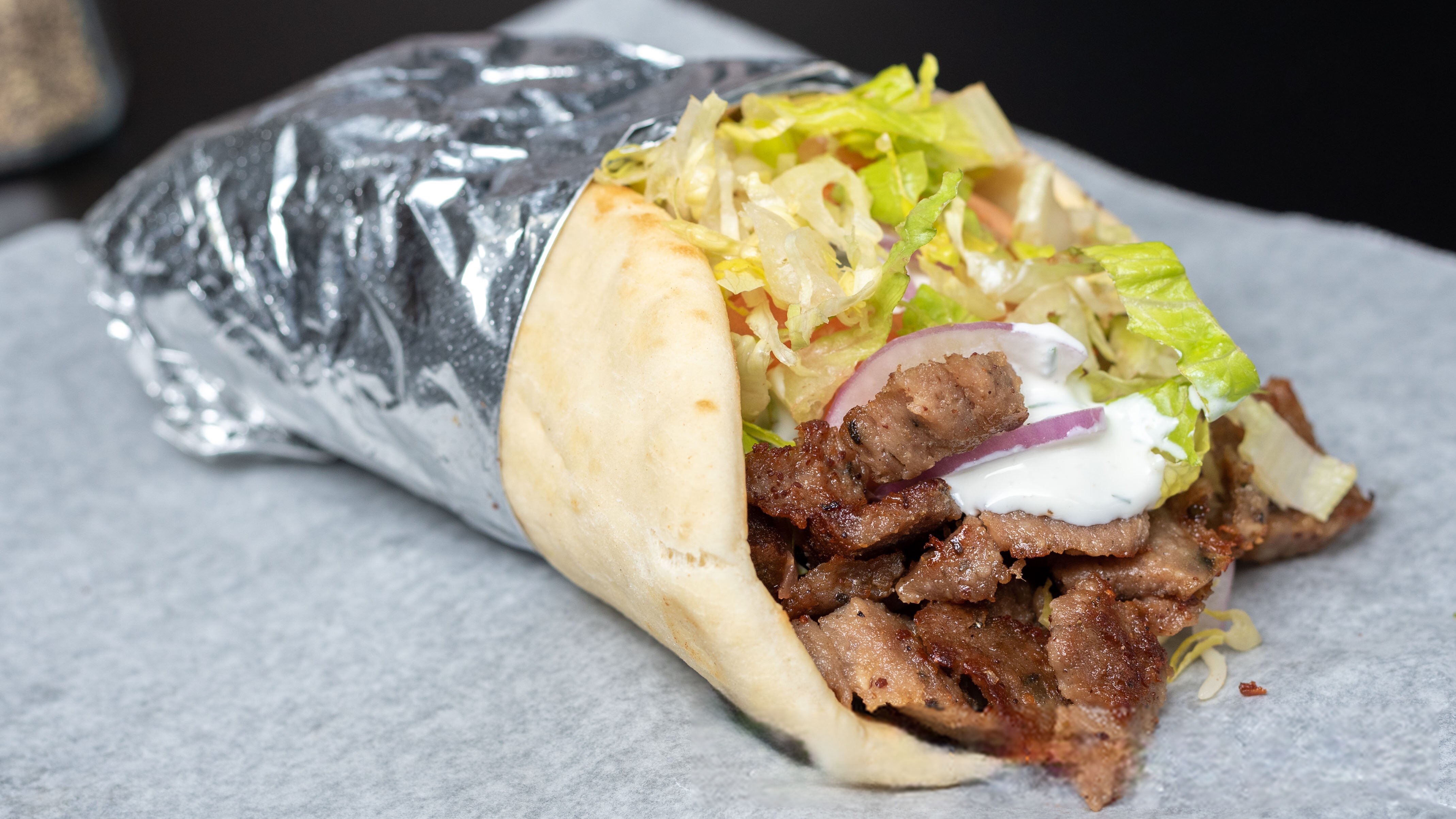 Order Beef Gyro Wrap food online from Halal-Stop store, San Francisco on bringmethat.com